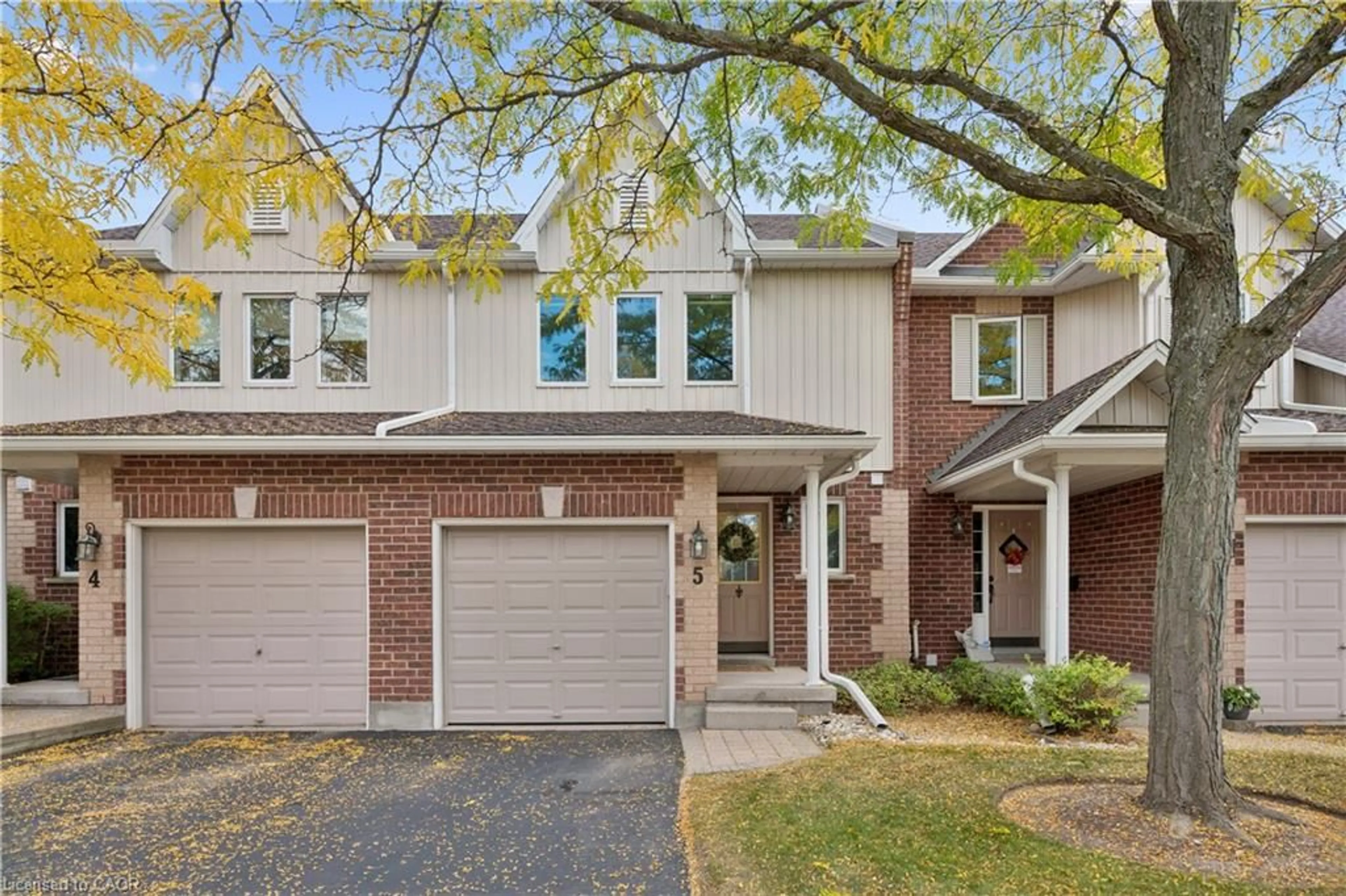 Home with brick exterior material, street for 39 Ptarmigan Dr #5, Guelph Ontario N1C 1E8