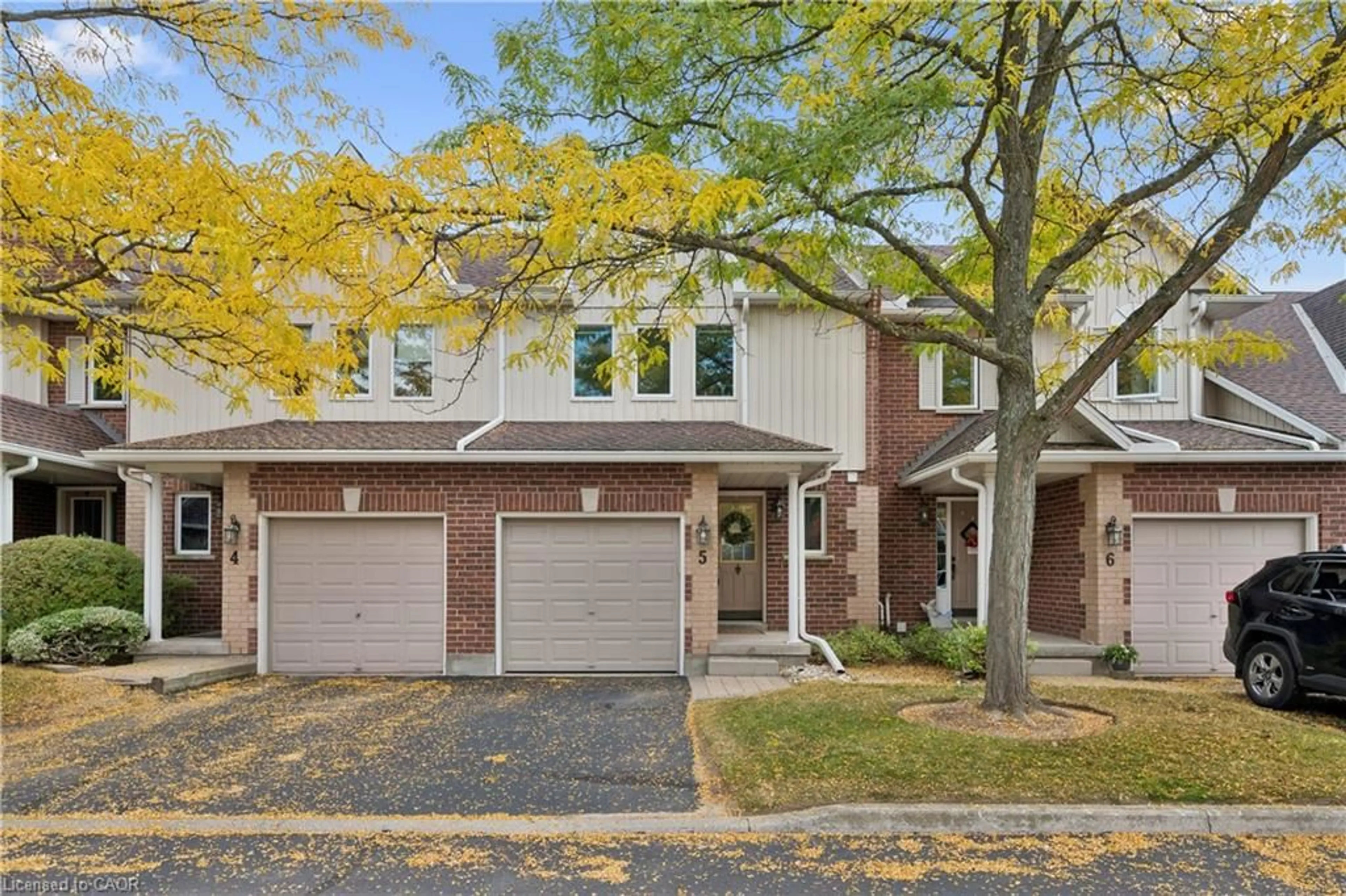 Home with brick exterior material, street for 39 Ptarmigan Dr #5, Guelph Ontario N1C 1E8
