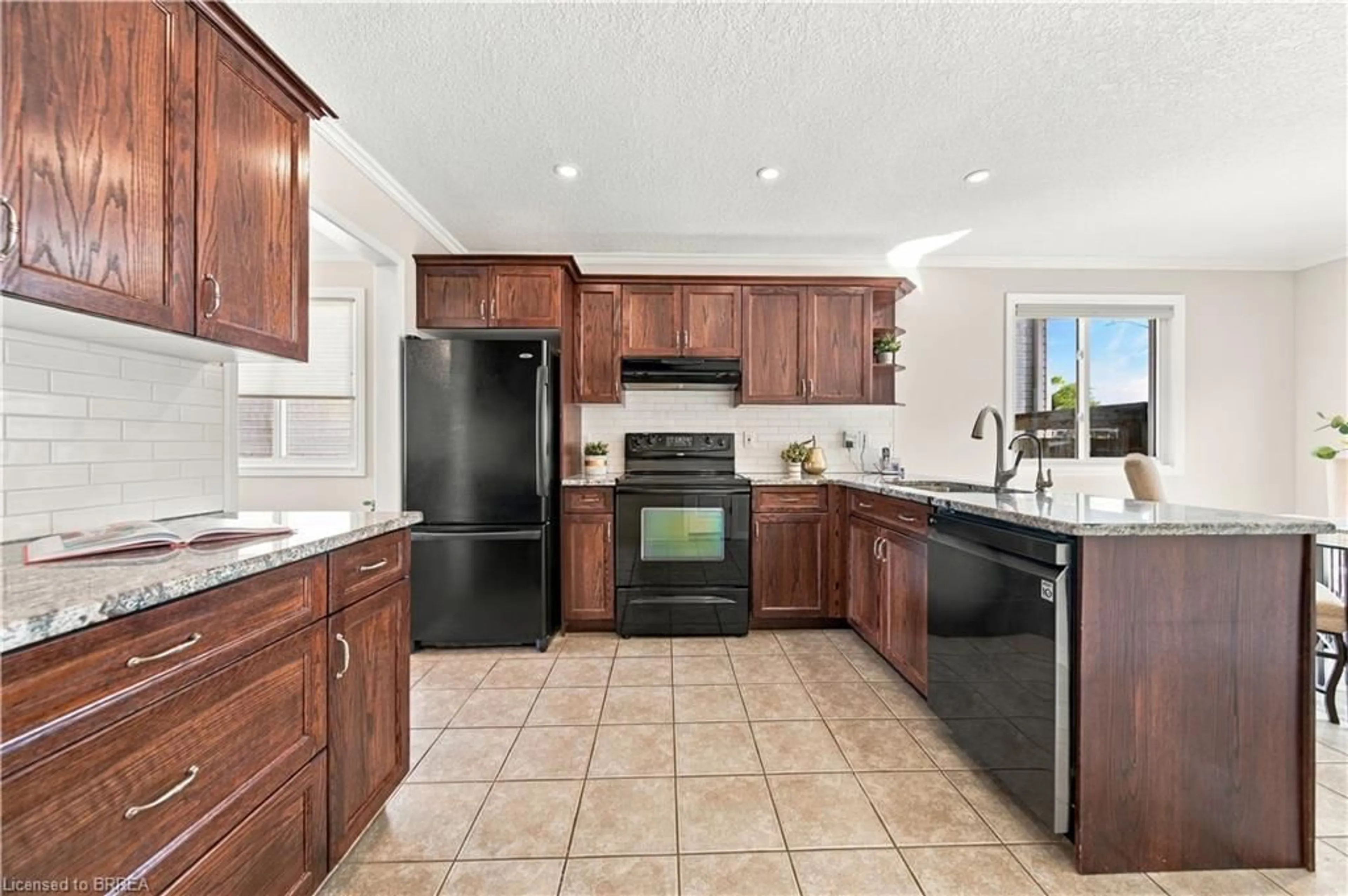 Open concept kitchen, ceramic/tile floor for 4 Macpherson Dr, Brant County Ontario N3L 4B5
