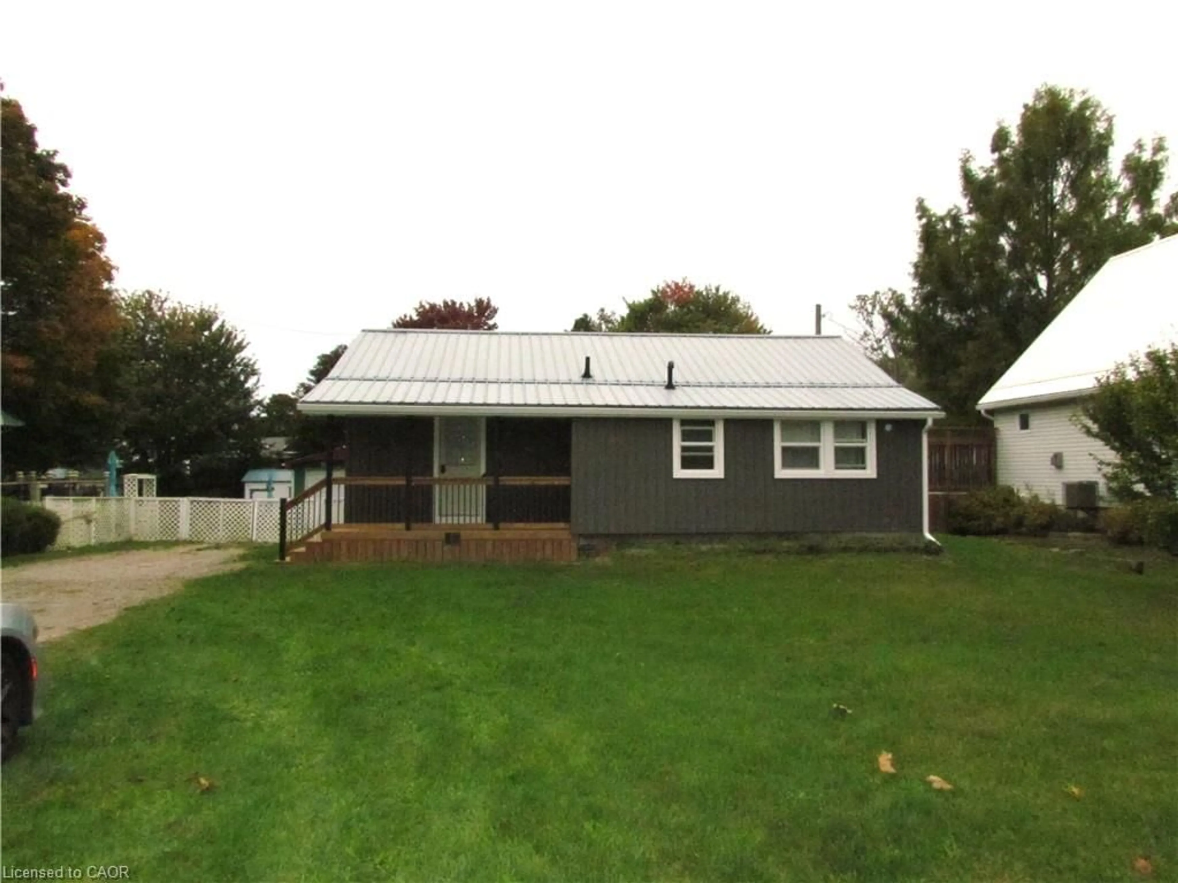 Home with vinyl exterior material, street for 17 Elizabeth St, Port Burwell Ontario N0J 1T0