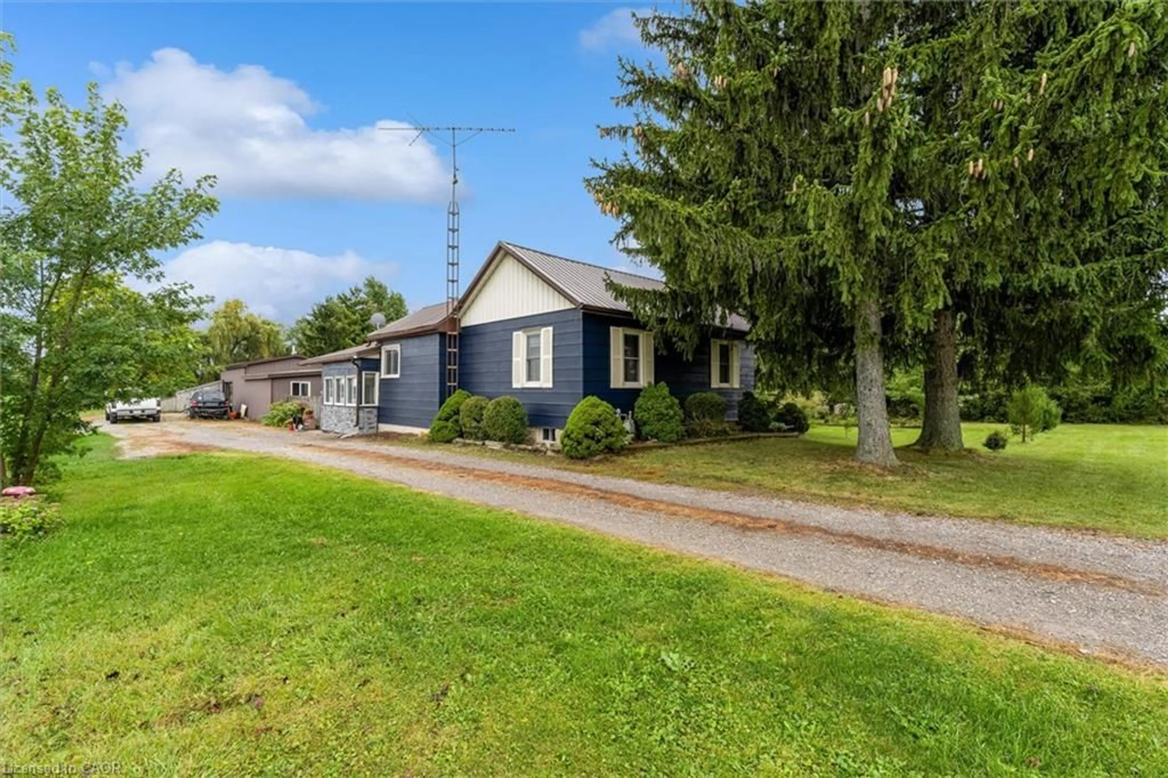 A pic from outside/outdoor area/front of a property/back of a property/a pic from drone, street for 404 Concession 5 Rd, Fisherville Ontario N0A 1G0