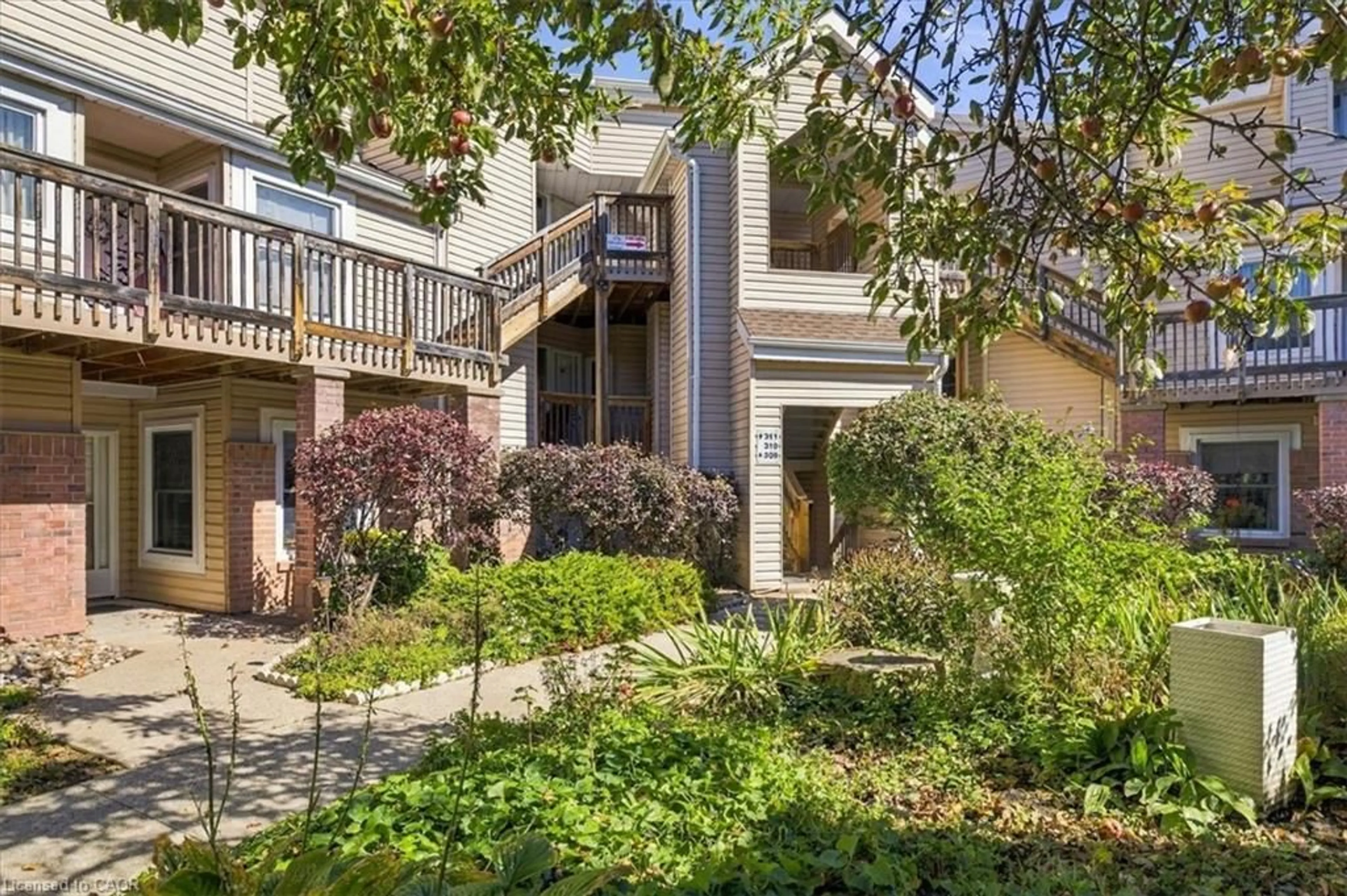 A pic from outside/outdoor area/front of a property/back of a property/a pic from drone, street for 1210 Thorpe Rd #311, Burlington Ontario L7S 2G8