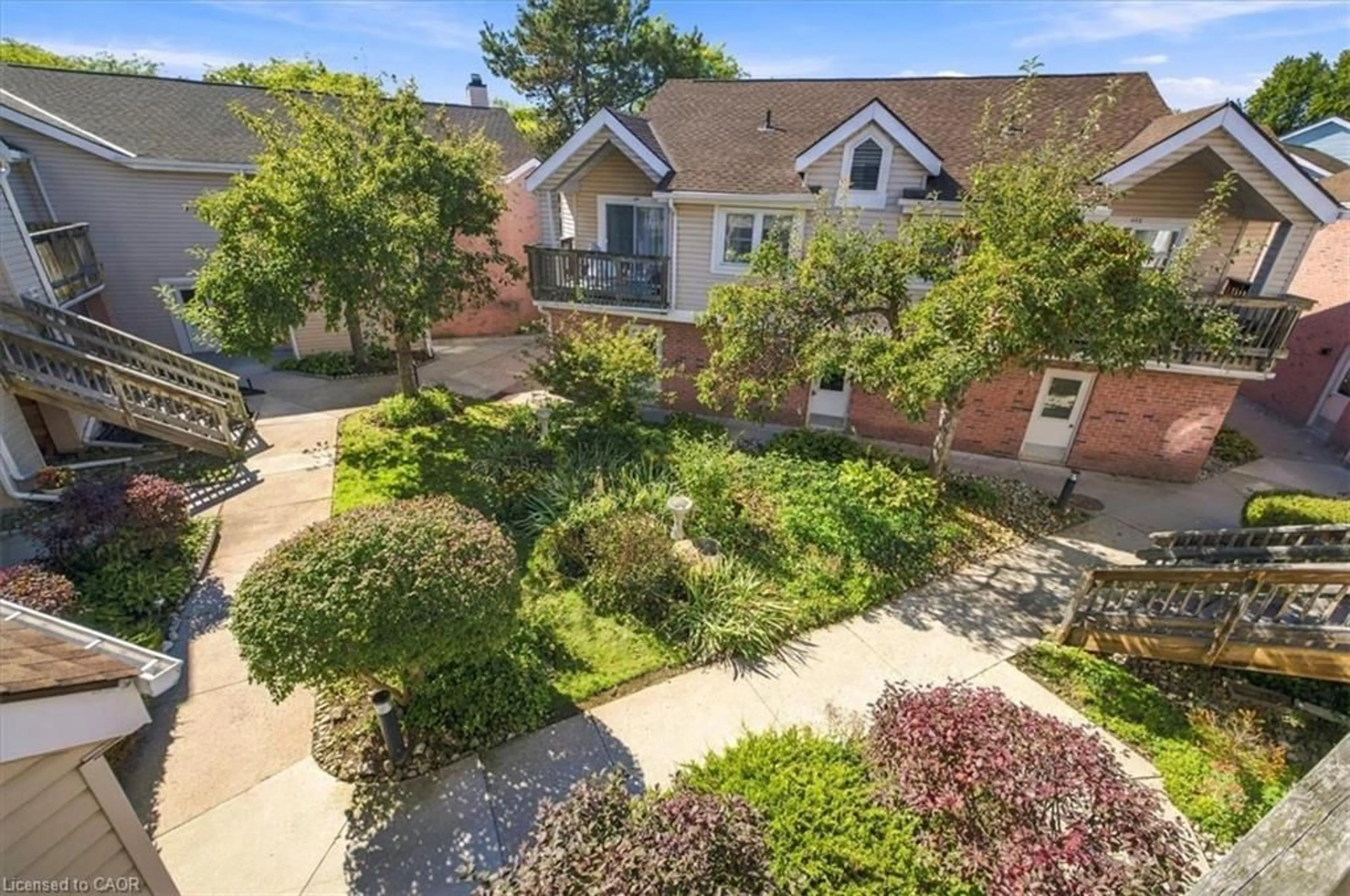 A pic from outside/outdoor area/front of a property/back of a property/a pic from drone, street for 1210 Thorpe Rd #311, Burlington Ontario L7S 2G8