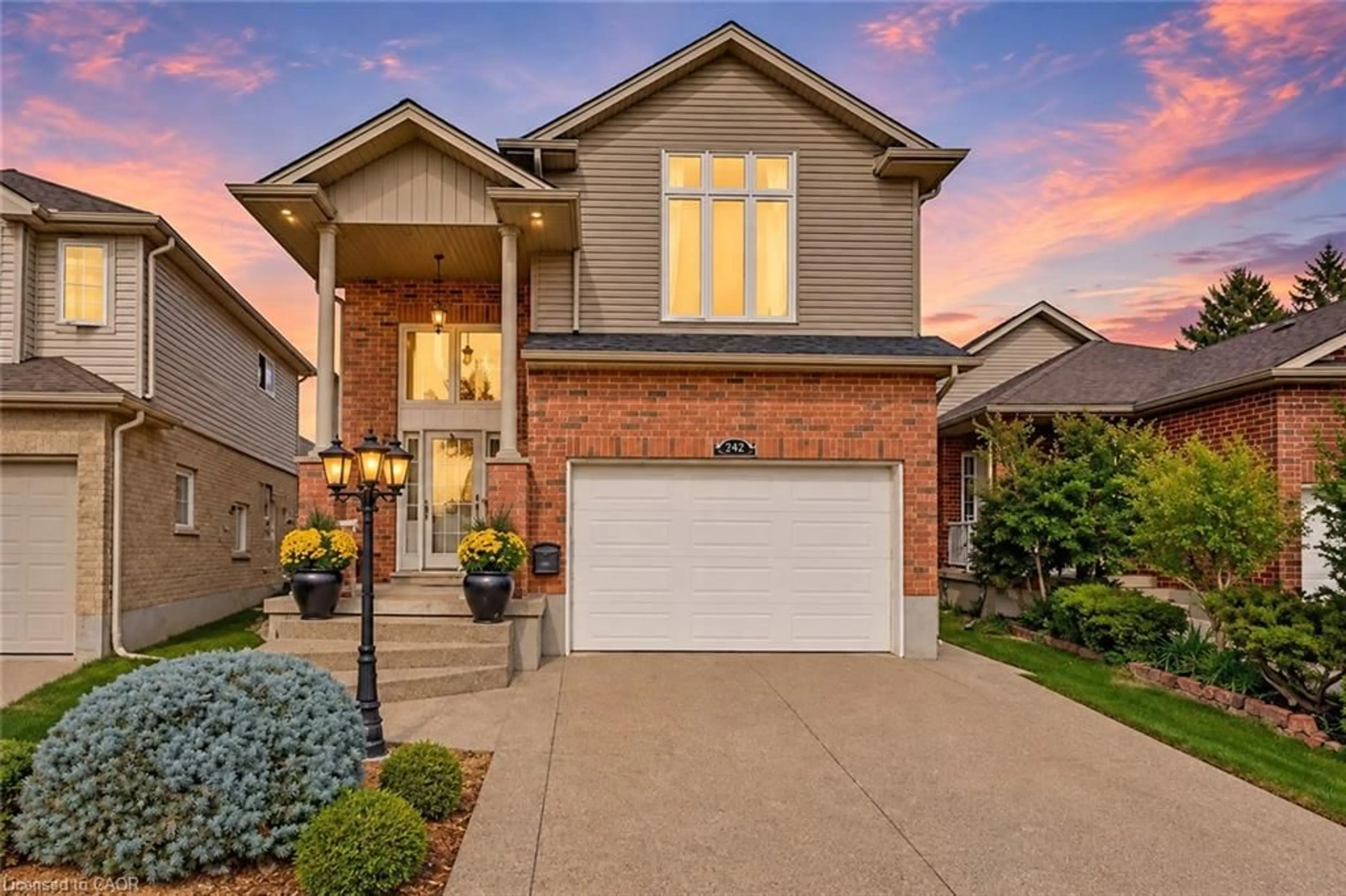 Home with brick exterior material, street for 240 Woodhaven Rd #A, Kitchener Ontario N2C 1V5