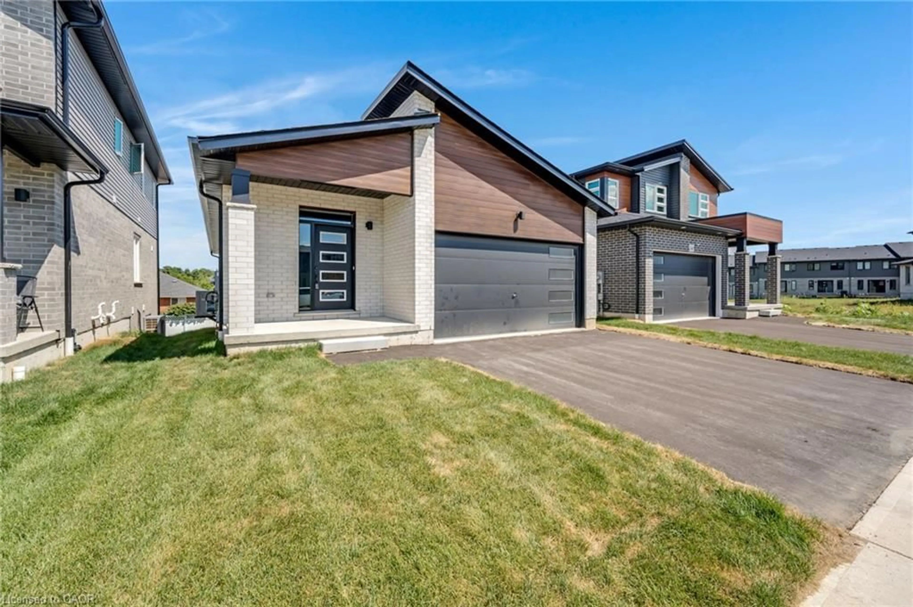 Home with brick exterior material, street for 52 Moon Cres, Cambridge Ontario N1S 5A7
