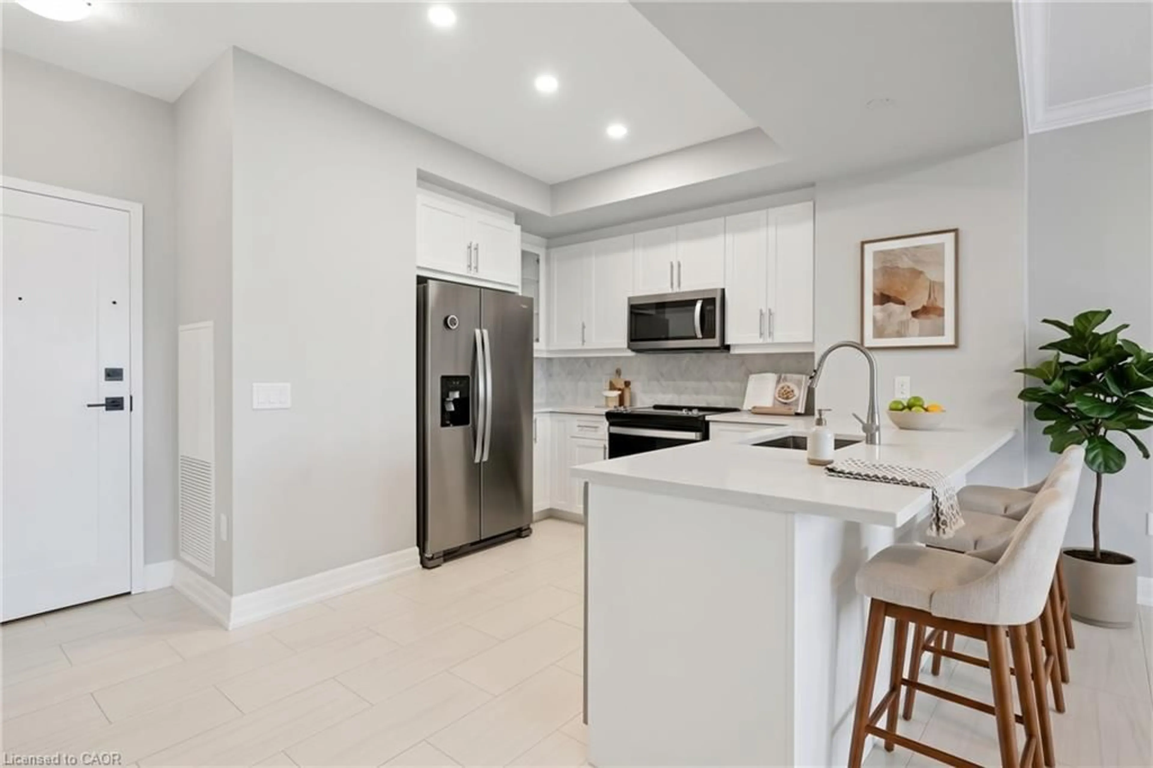 Open concept kitchen, ceramic/tile floor for 1880 Gordon St #908, Guelph Ontario N1L 0P5