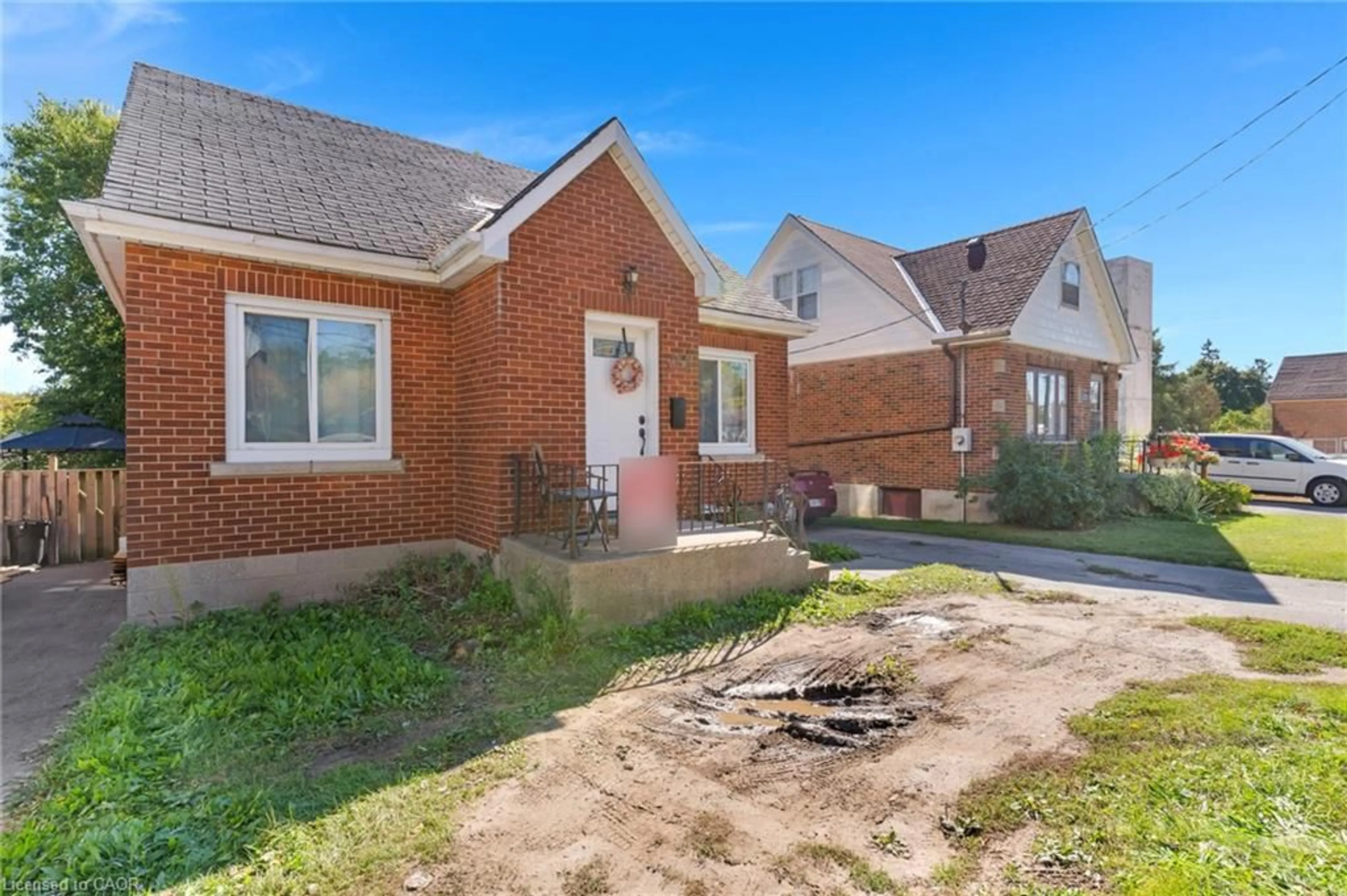 Home with brick exterior material, street for 259 West St, Brantford Ontario N3R 3V4