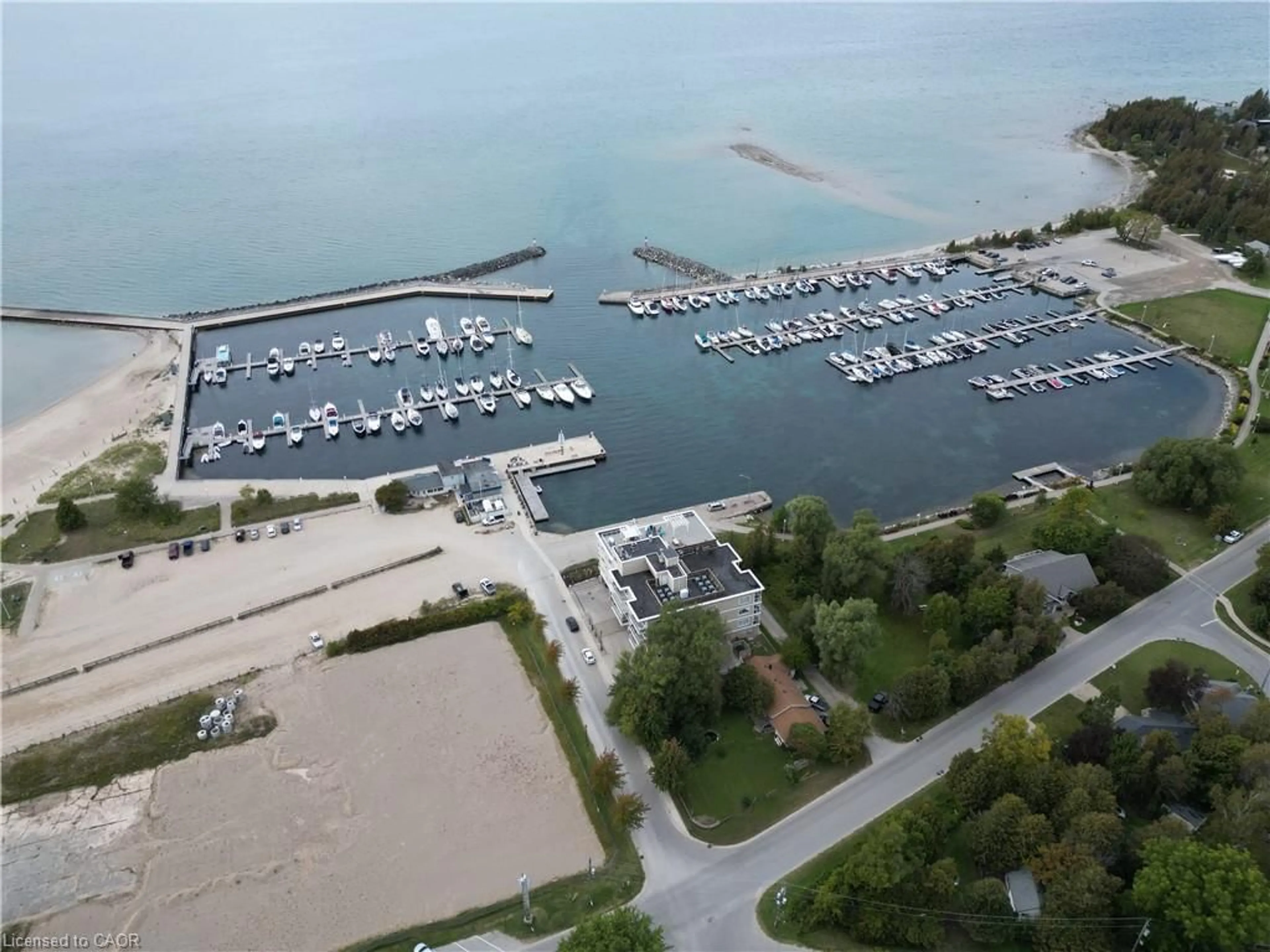 A pic from outside/outdoor area/front of a property/back of a property/a pic from drone, water/lake/river/ocean view for 137 Elgin St #202, Port Elgin Ontario N0H 2C2
