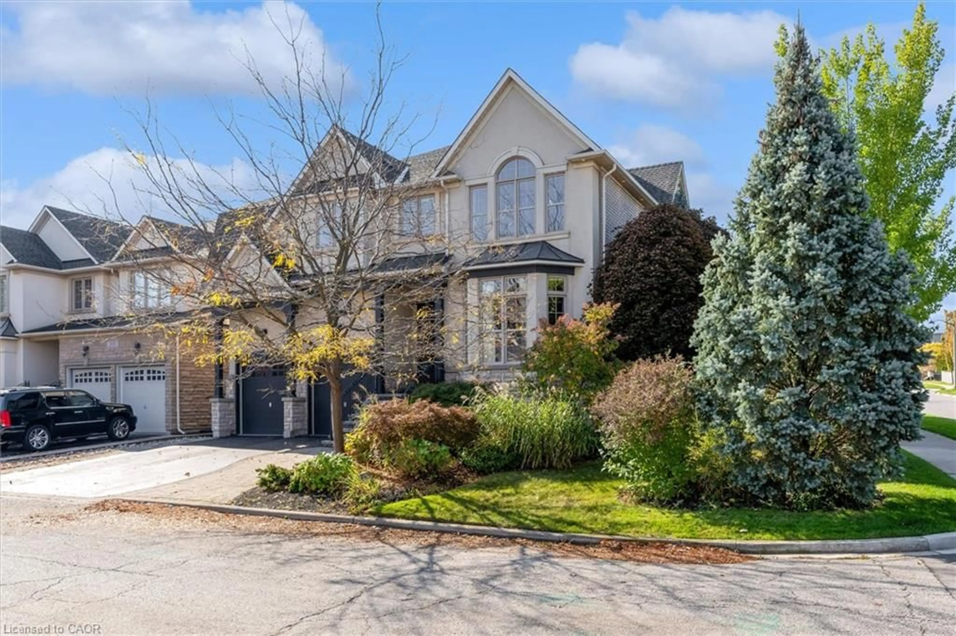 Home with brick exterior material, street for 2434 Taylorwood Dr, Oakville Ontario L6H 0C8