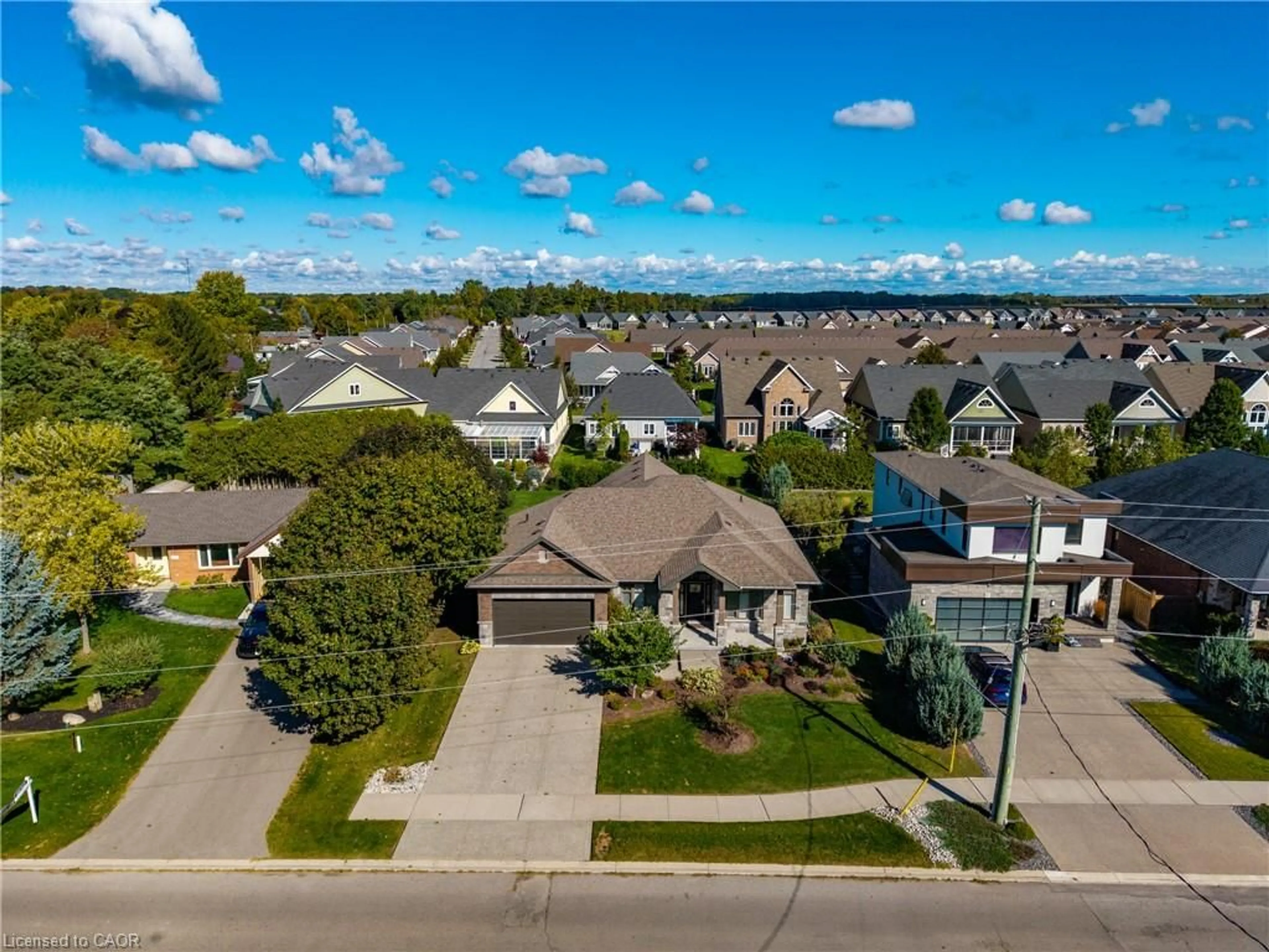 A pic from outside/outdoor area/front of a property/back of a property/a pic from drone, street for 135 New Lakeshore Rd, Port Dover Ontario N0A 1N3