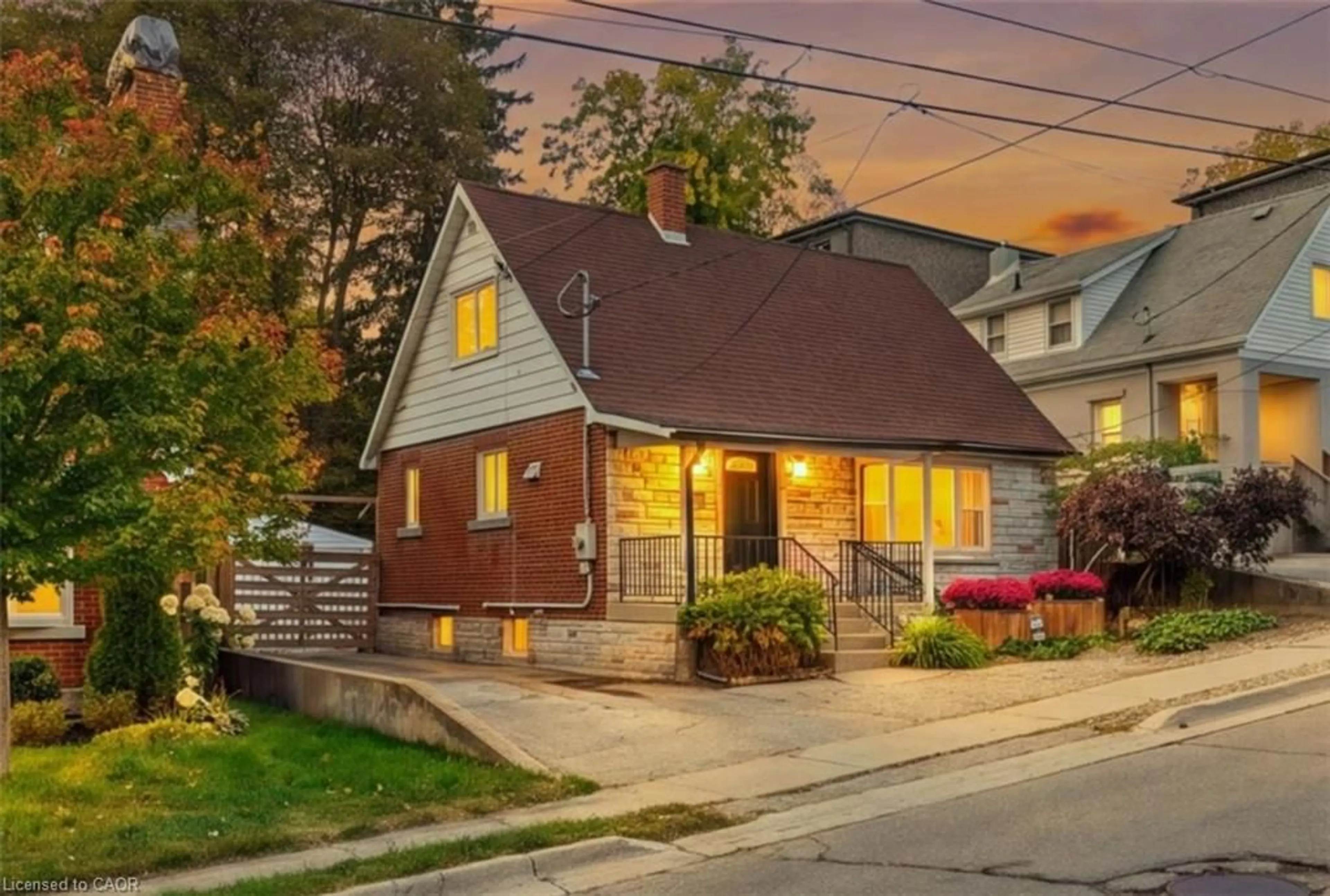 Home with brick exterior material, street for 106 Cedar St, Kitchener Ontario N2G 3L9