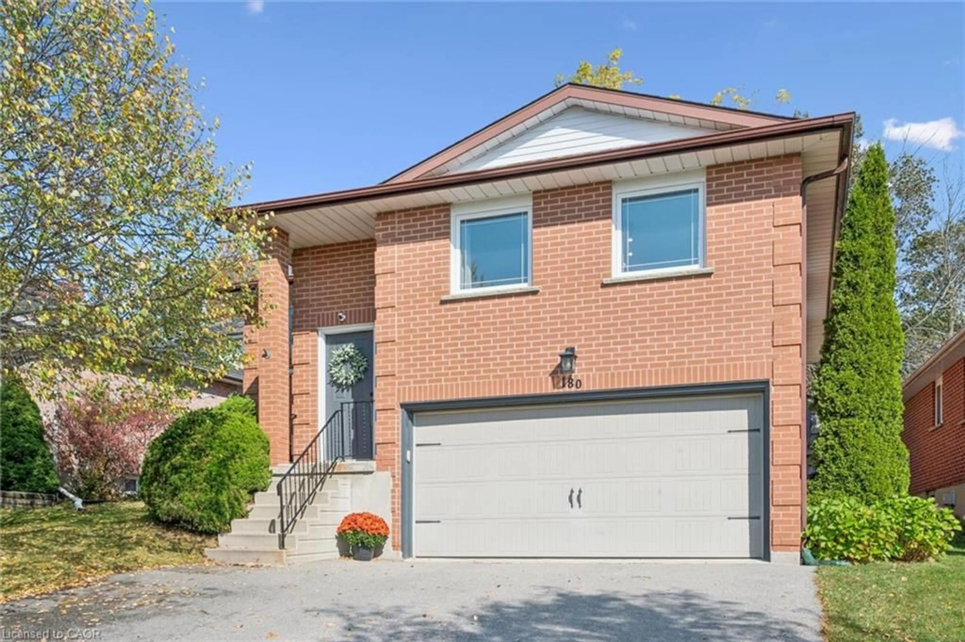 Home with brick exterior material, street for 180 Eastforest Trail, Kitchener Ontario N2N 3E7