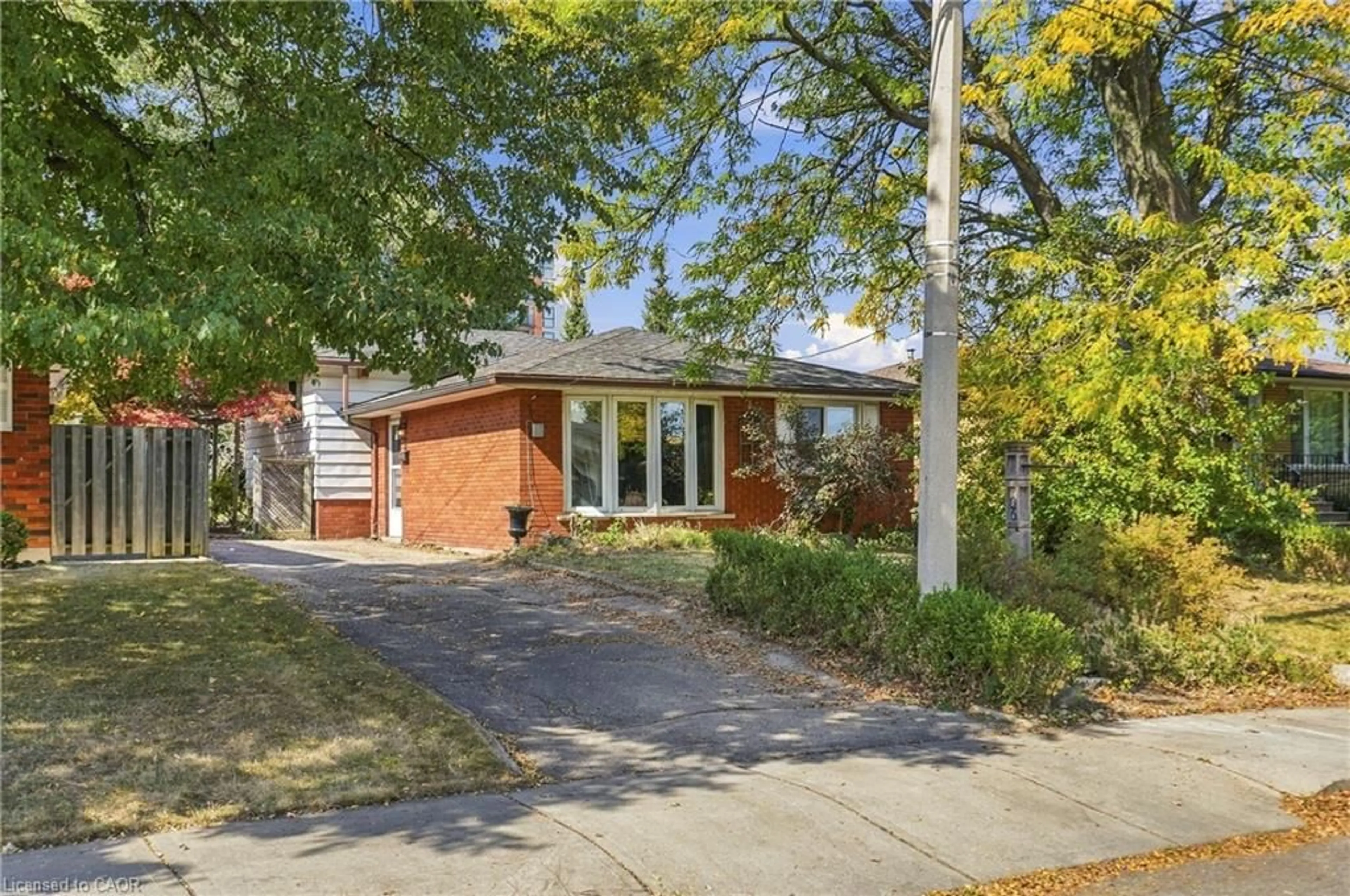 Home with brick exterior material, street for 106 Victor Blvd, Hamilton Ontario L9A 2V4