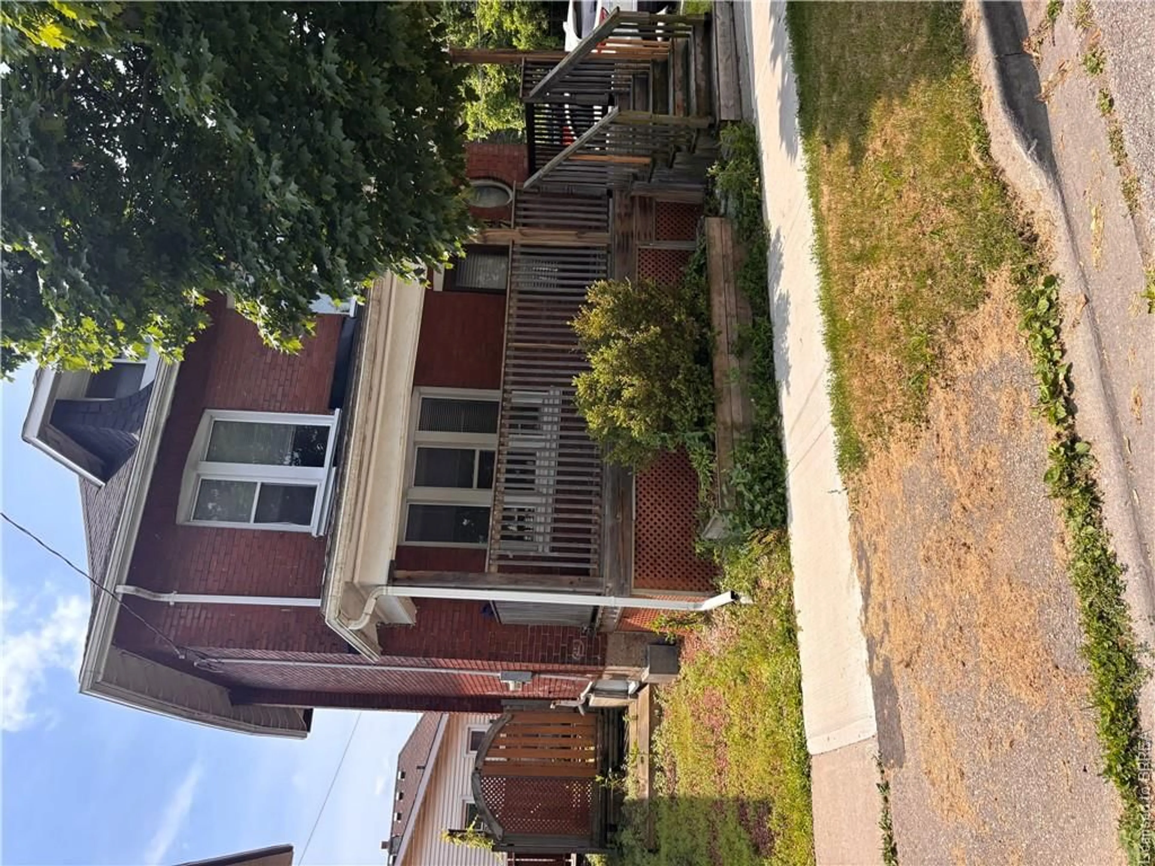 Home with brick exterior material, street for 47 Grey St, Brantford Ontario N3T 2T1