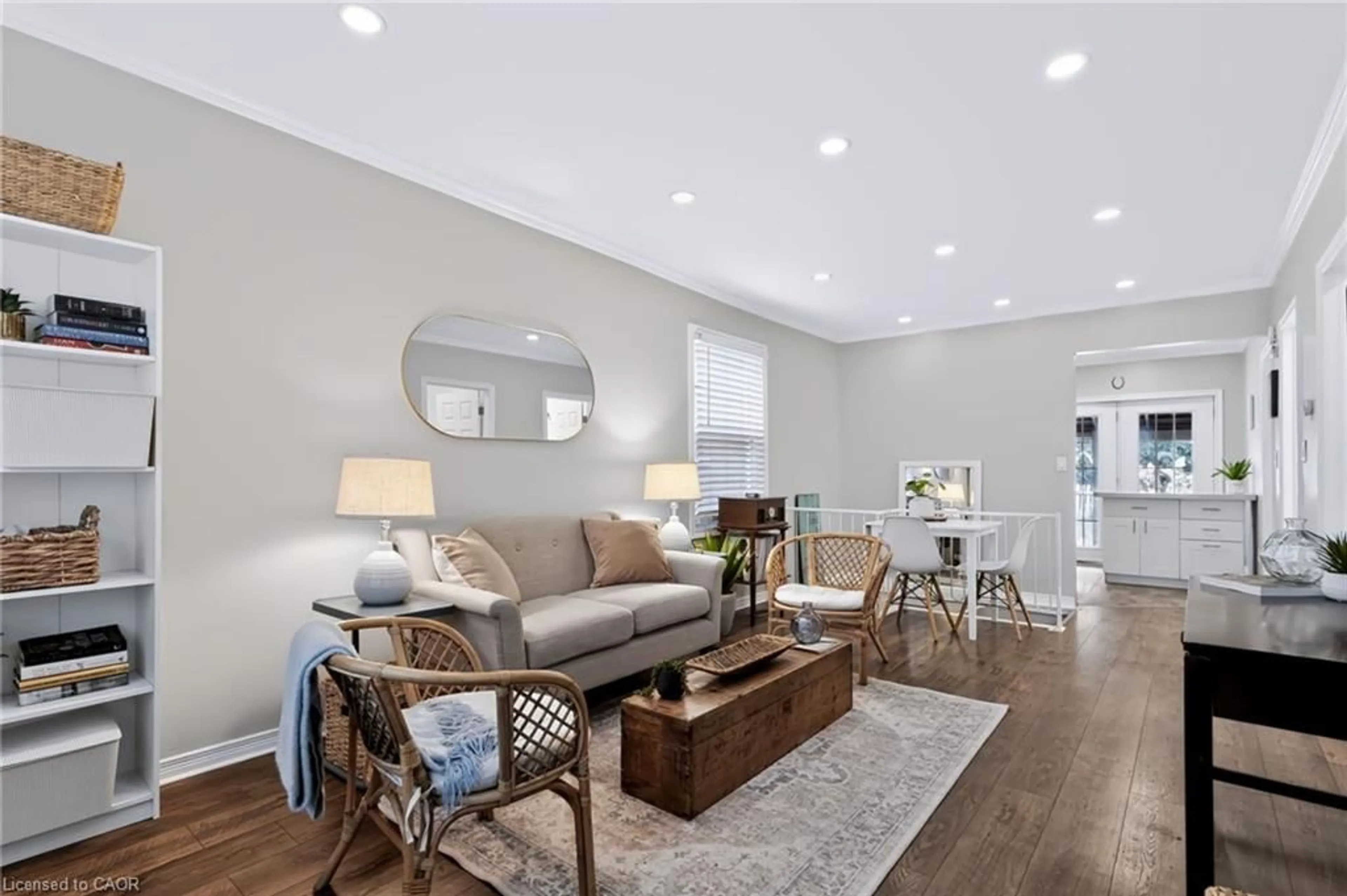 Living room with furniture, wood/laminate floor for 104 Niagara St, Hamilton Ontario L8L 6A7