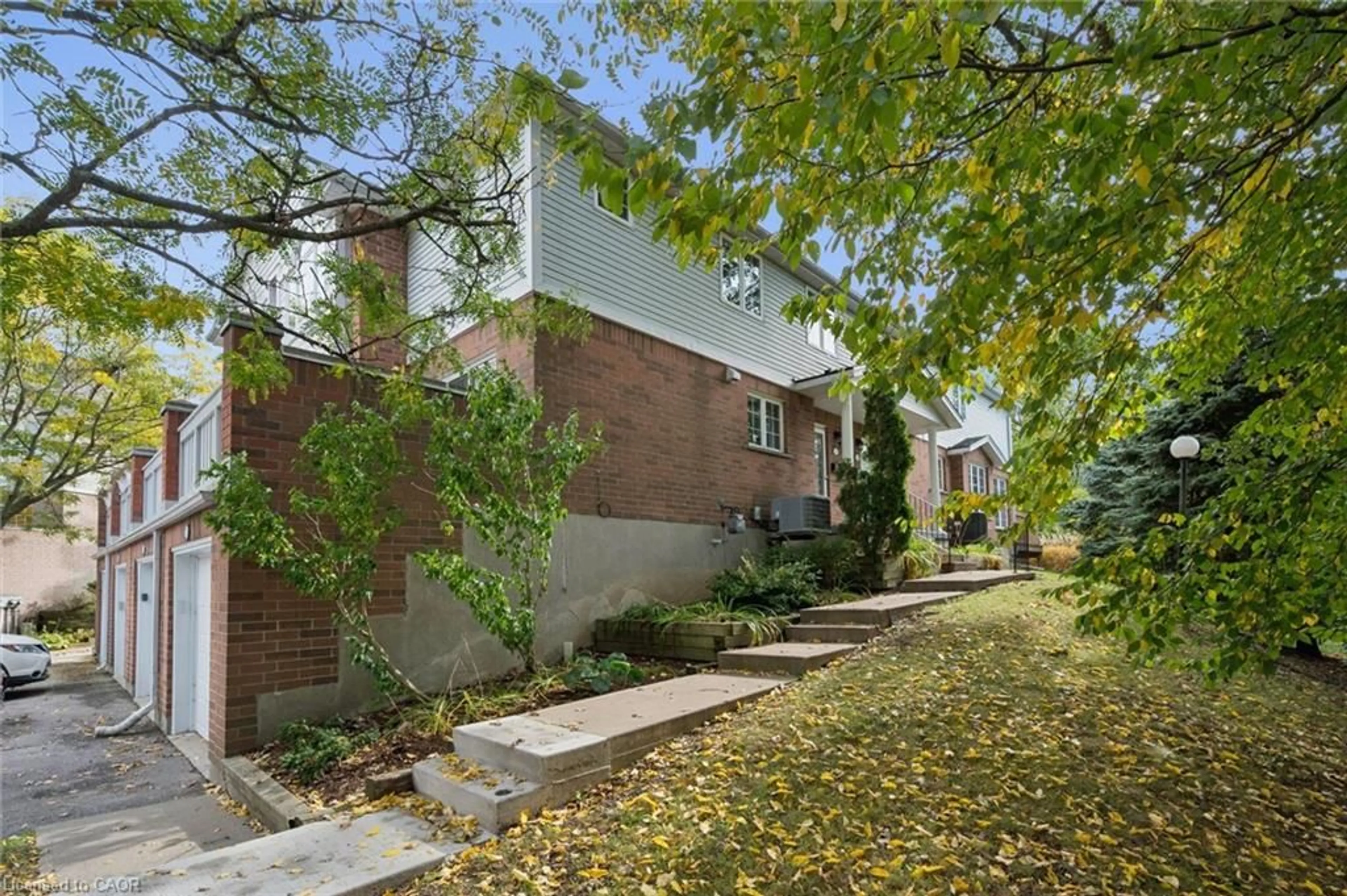 Home with brick exterior material, street for 941 Gordon St #20, Guelph Ontario N1G 4R9