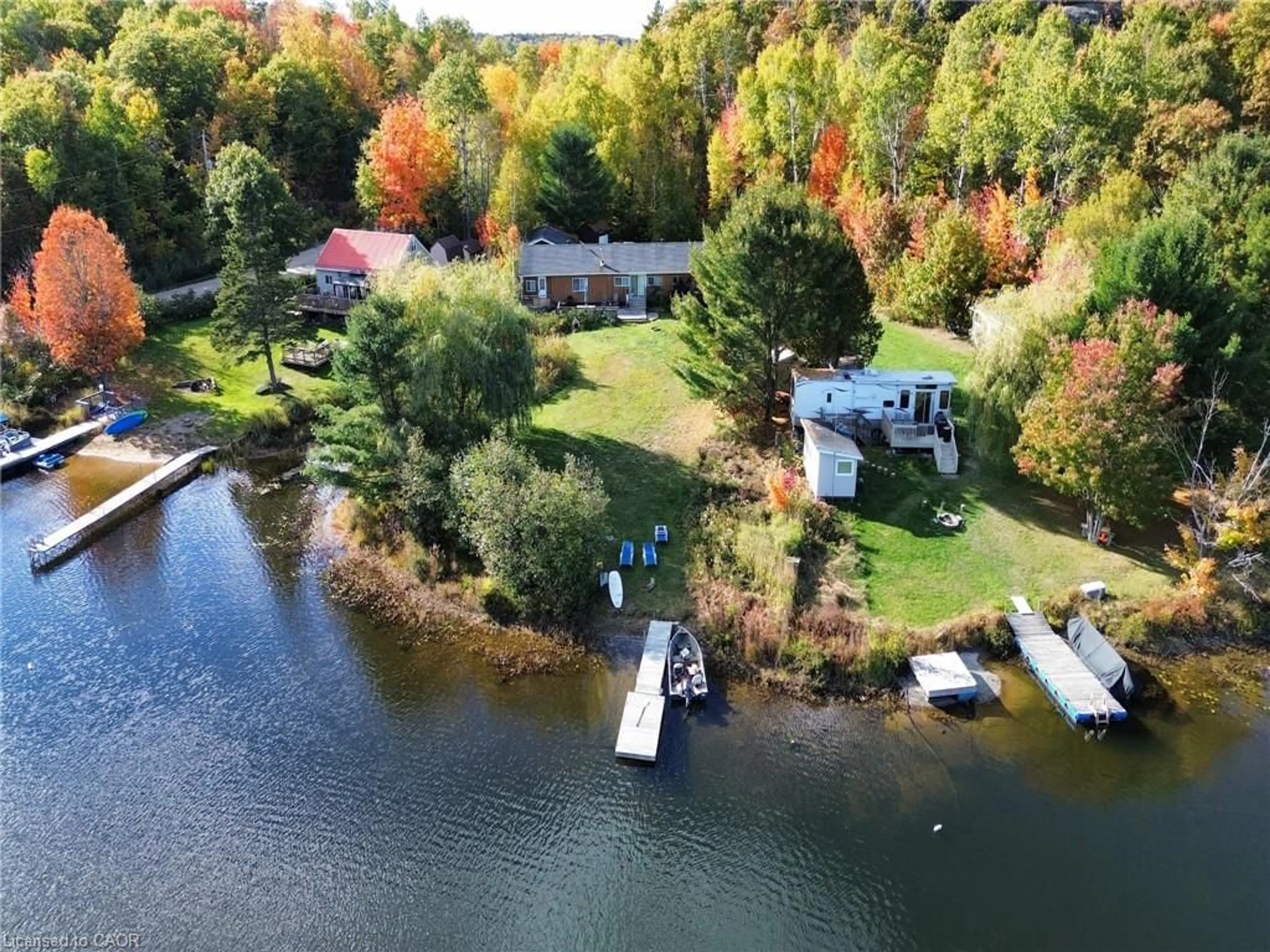 A pic from outside/outdoor area/front of a property/back of a property/a pic from drone, water/lake/river/ocean view for 462 Waterfalls Rd, Walford Ontario P0P 2E0