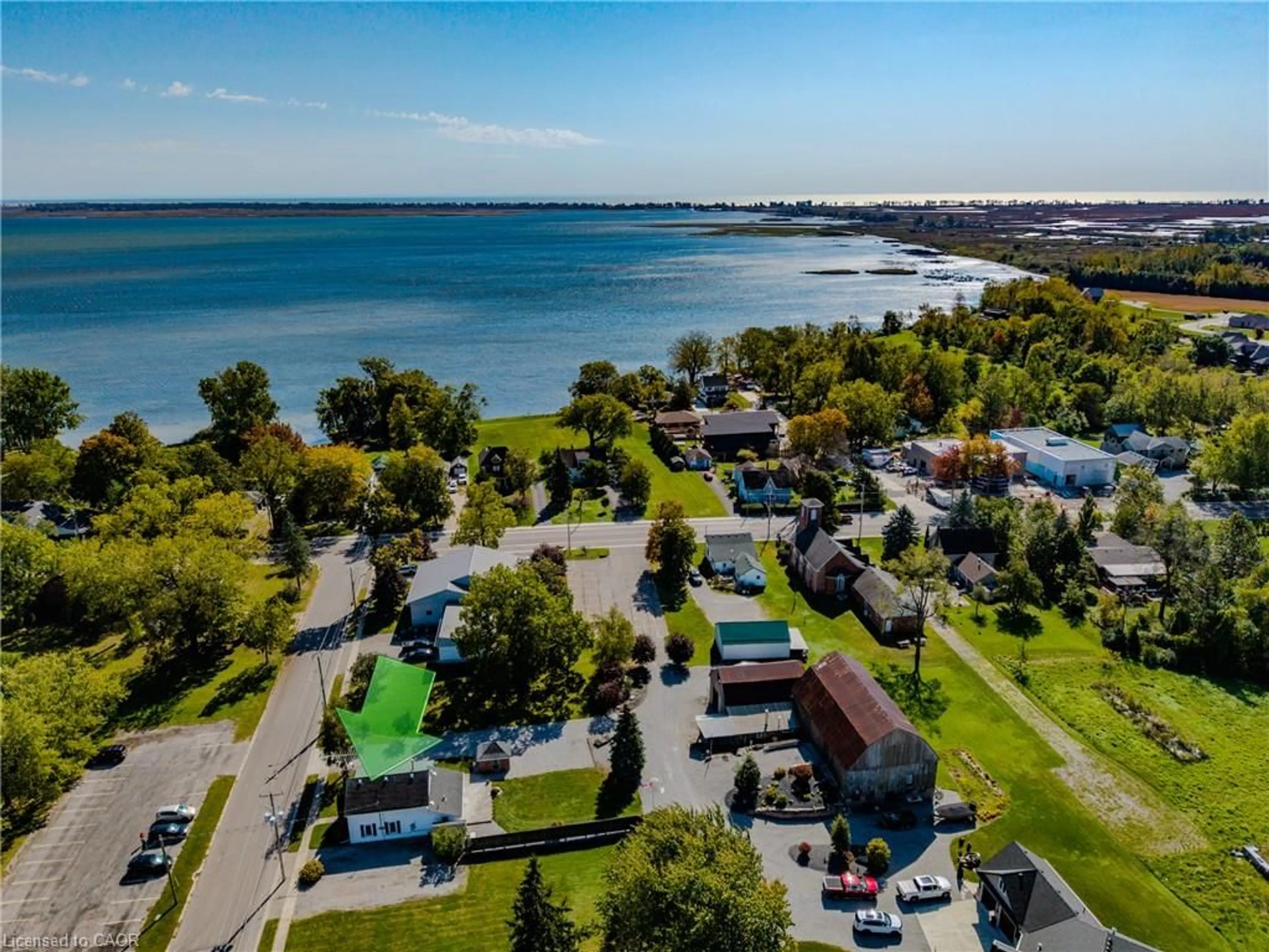 A pic from outside/outdoor area/front of a property/back of a property/a pic from drone, water/lake/river/ocean view for 9 College Ave, Port Rowan Ontario N0E 1M0