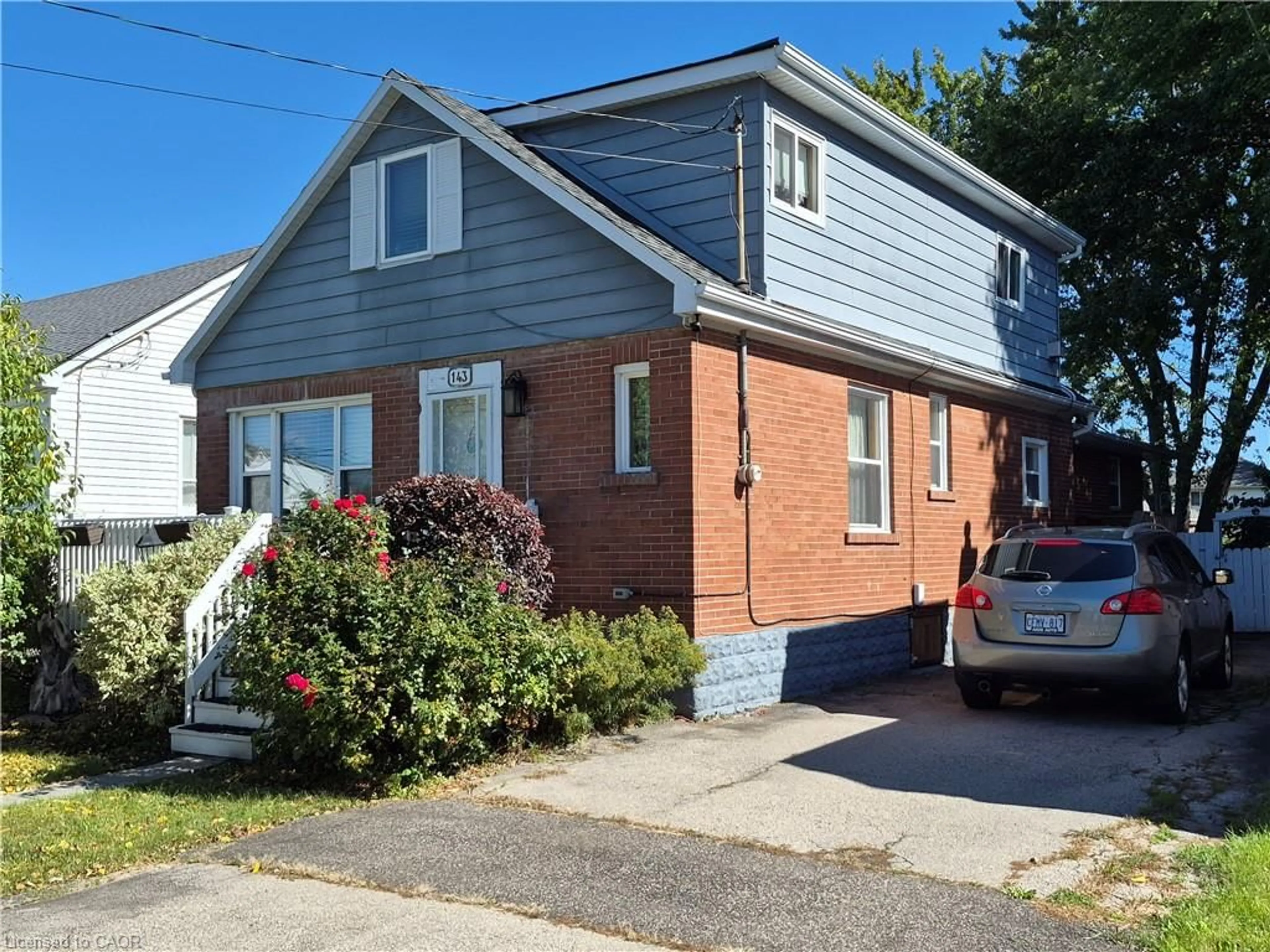 Home with brick exterior material, street for 143 Walter Ave, Hamilton Ontario L8K 3K8
