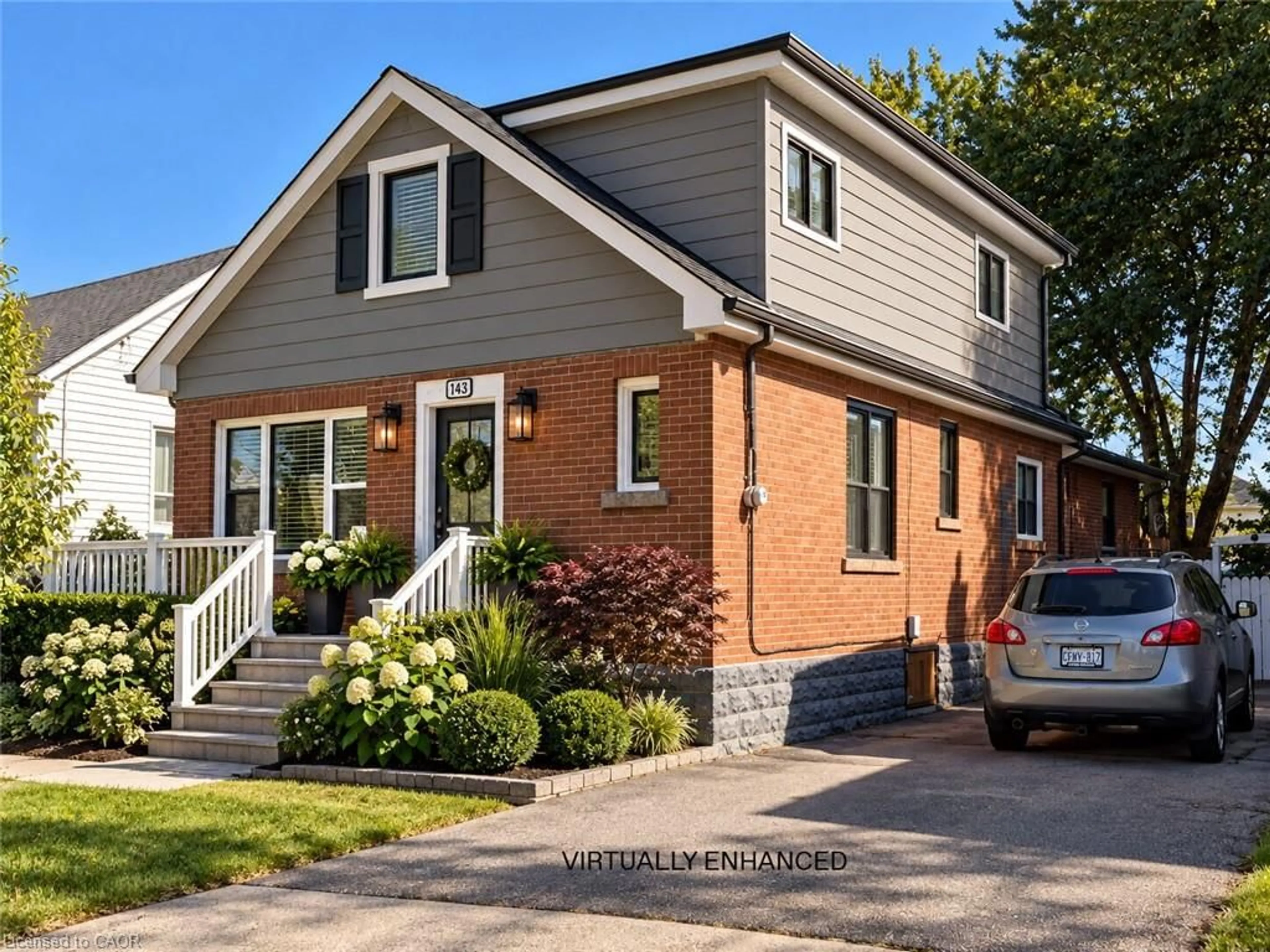 Home with brick exterior material, street for 143 Walter Ave, Hamilton Ontario L8K 3K8