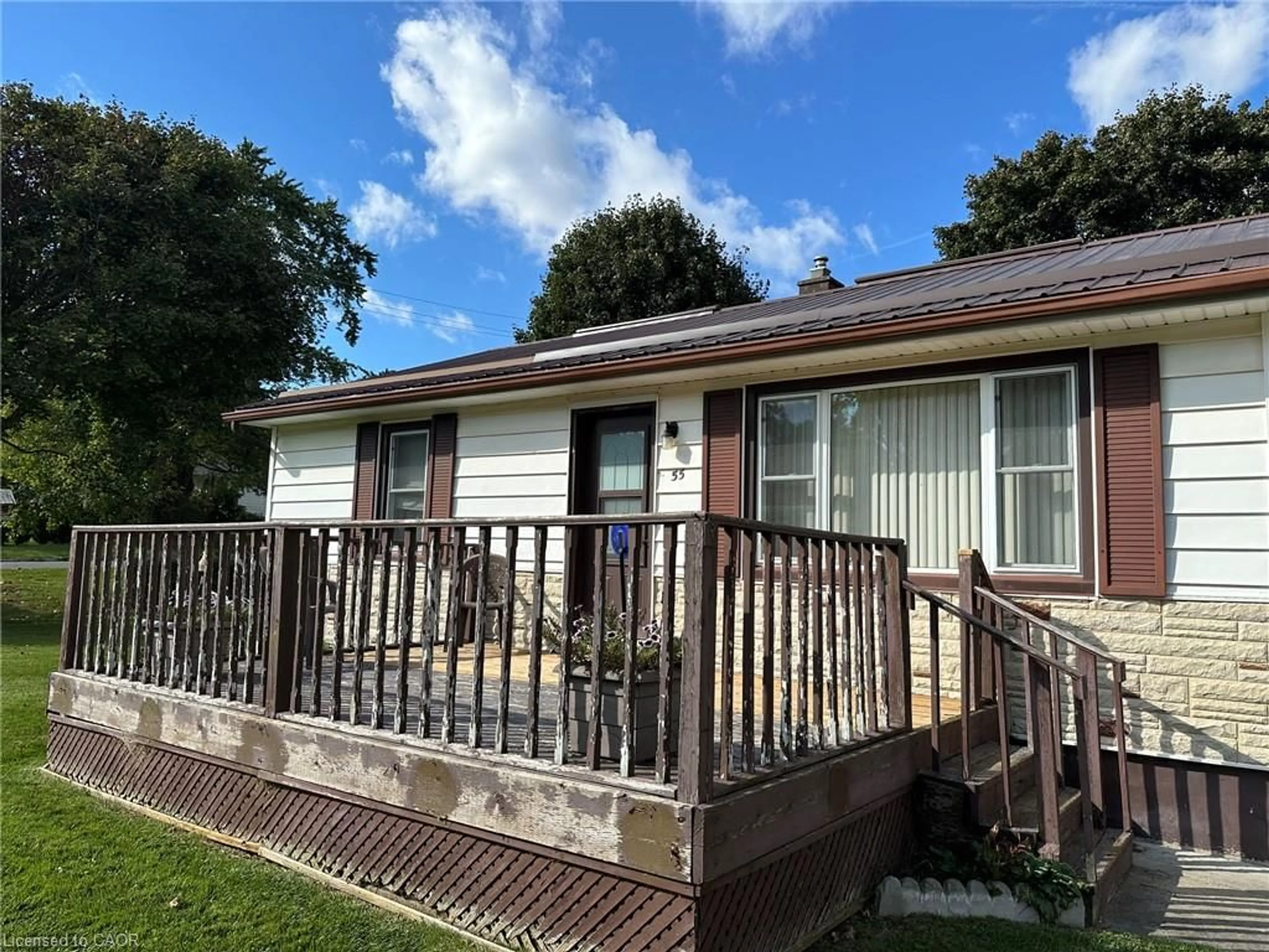 Home with vinyl exterior material, street for 55 Poplar St, Simcoe Ontario N3Y 1B1