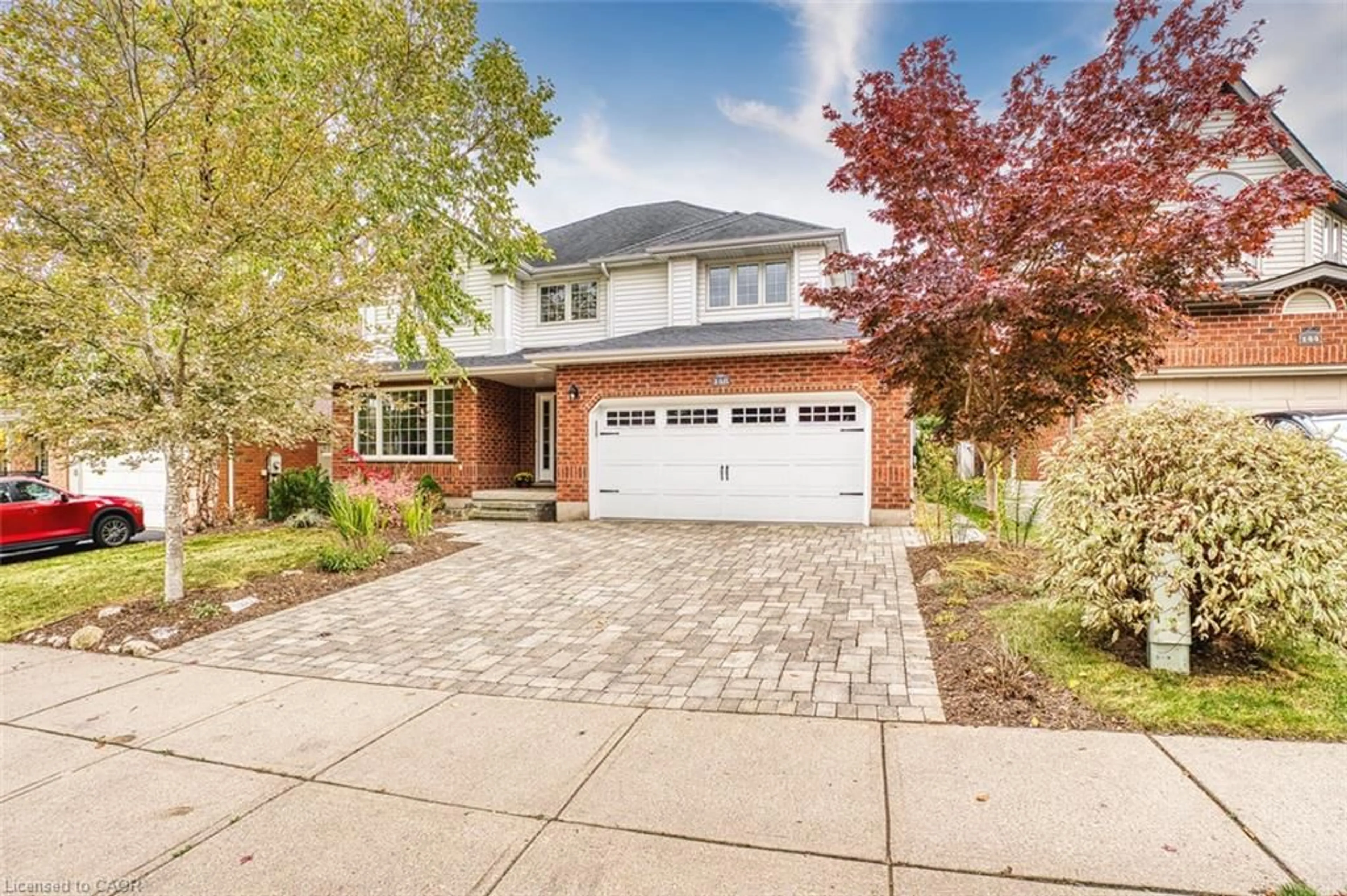 Home with brick exterior material, street for 148 Carolinian Lane, Cambridge Ontario N1S 5B8