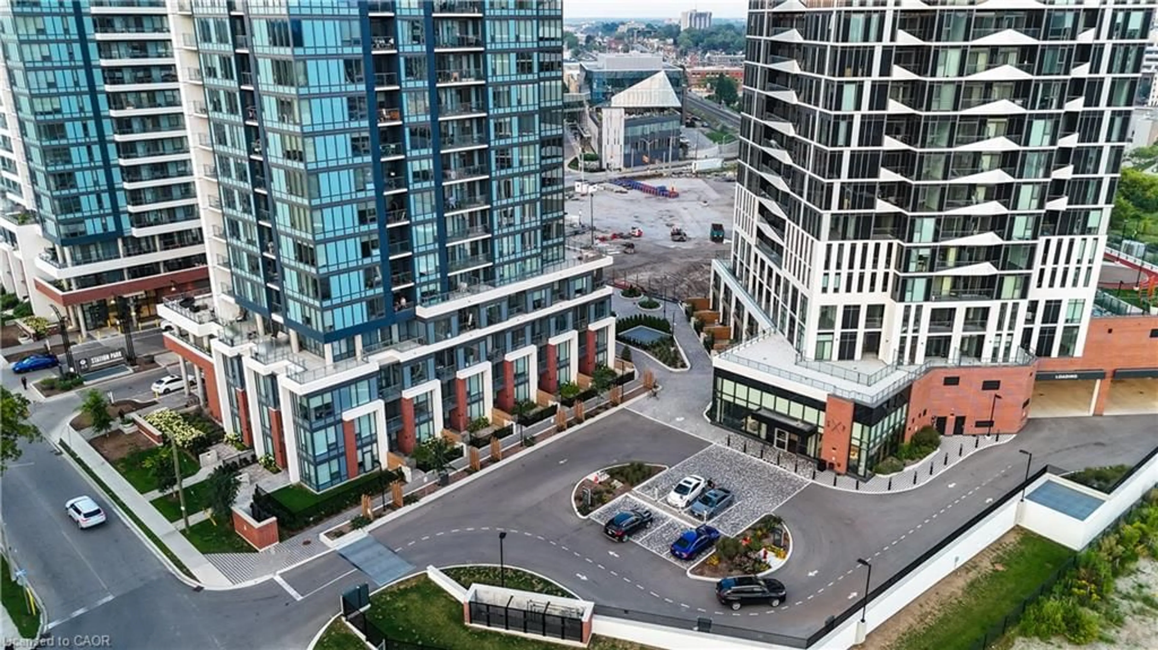 A pic from outside/outdoor area/front of a property/back of a property/a pic from drone, city buildings view from balcony for 15 Wellington St #1909, Kitchener Ontario N2G 0E4