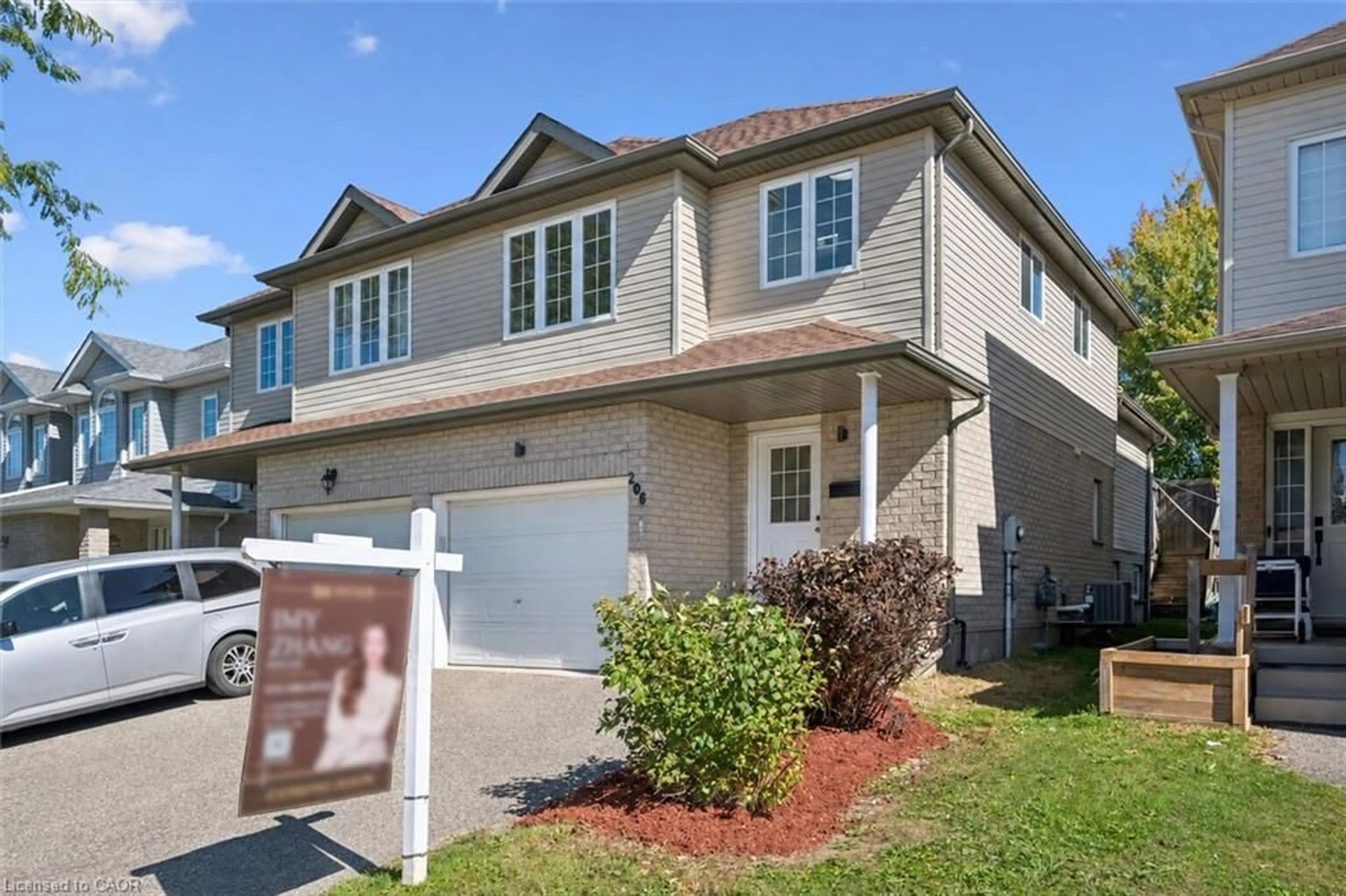 Home with vinyl exterior material, street for 206 Buttercup Crt, Waterloo Ontario N2V 2W8