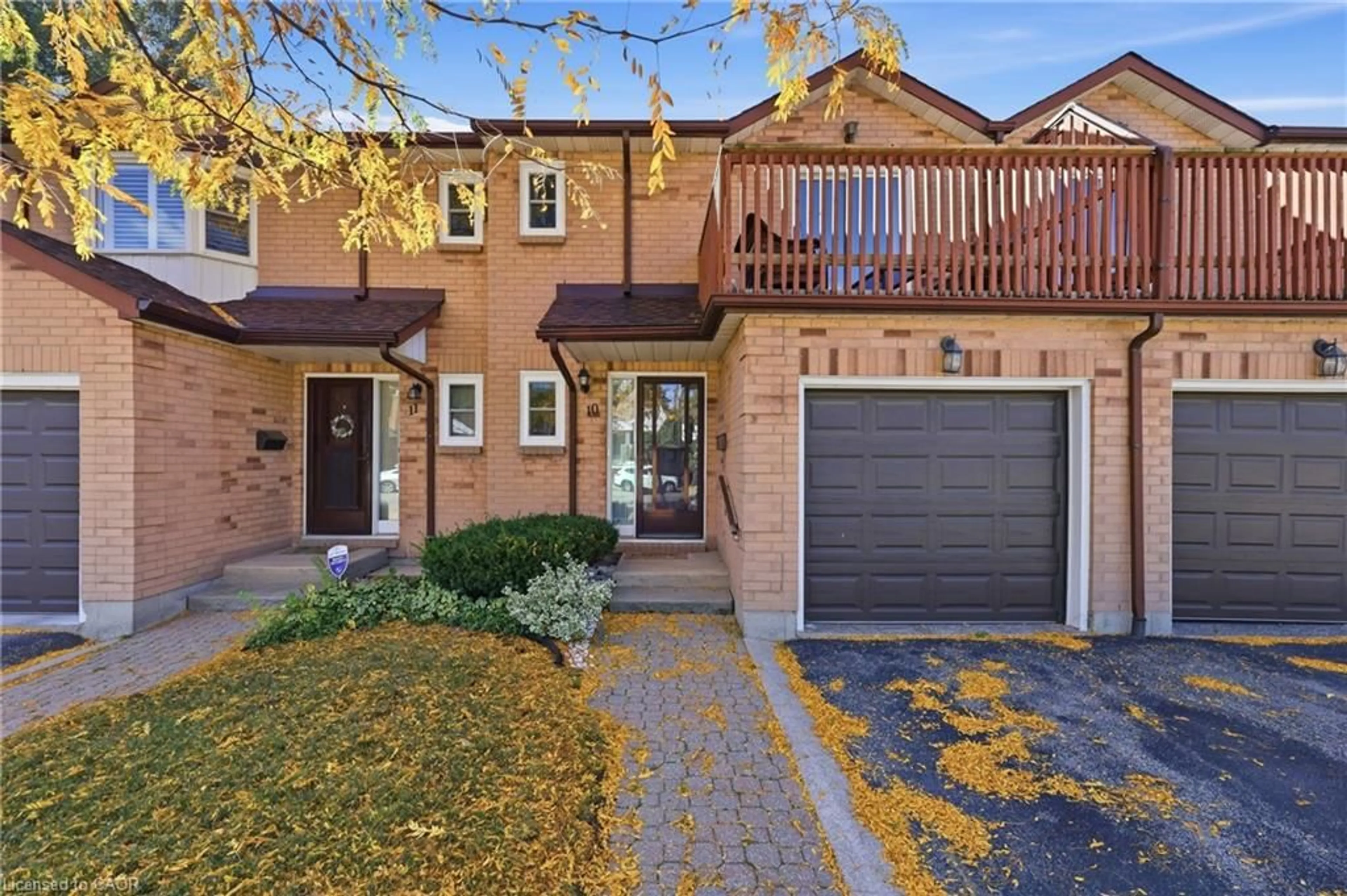 Home with brick exterior material, street for 14 Brucedale Ave #10, Hamilton Ontario L9A 1M8