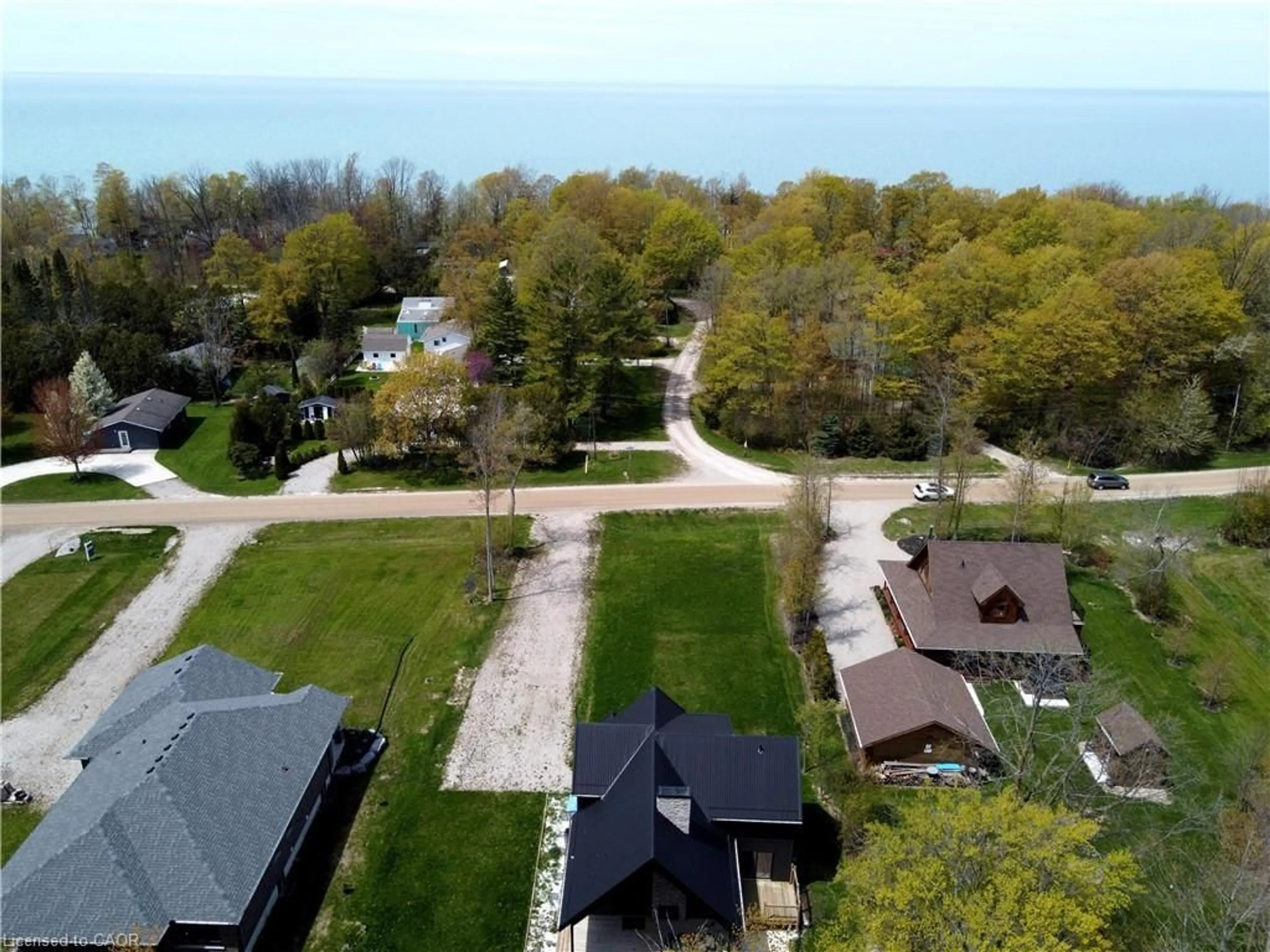 A pic from outside/outdoor area/front of a property/back of a property/a pic from drone, water/lake/river/ocean view for 74362 Driftwood Dr, Bayfield Ontario N0M 1G0