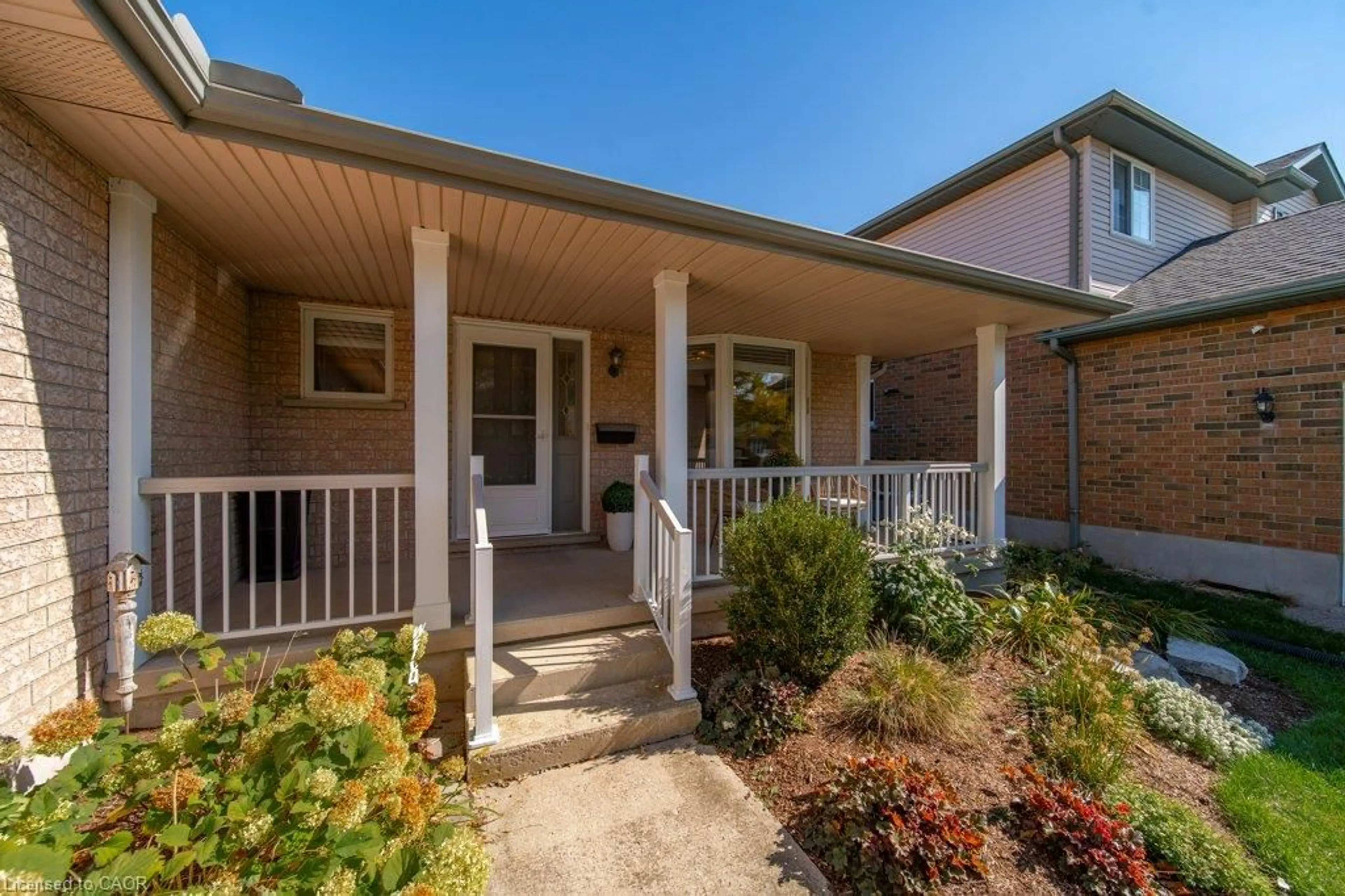 Home with brick exterior material, street for 587 Sandbanks Cres, Waterloo Ontario N2V 2K4