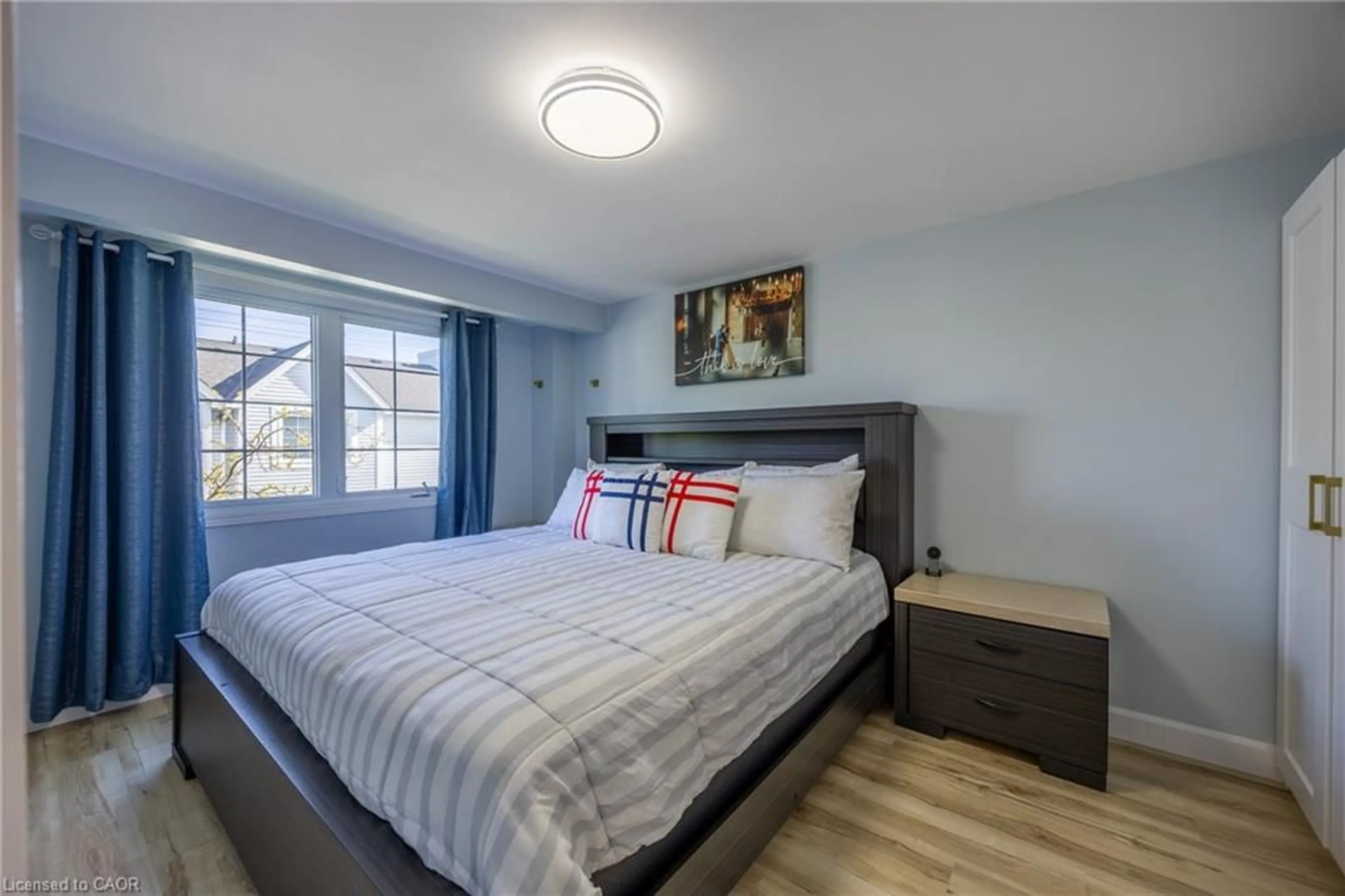 Bedroom with bed, wood/laminate floor for 14 New Lakeshore Rd #17, Port Dover Ontario N0A 1N8