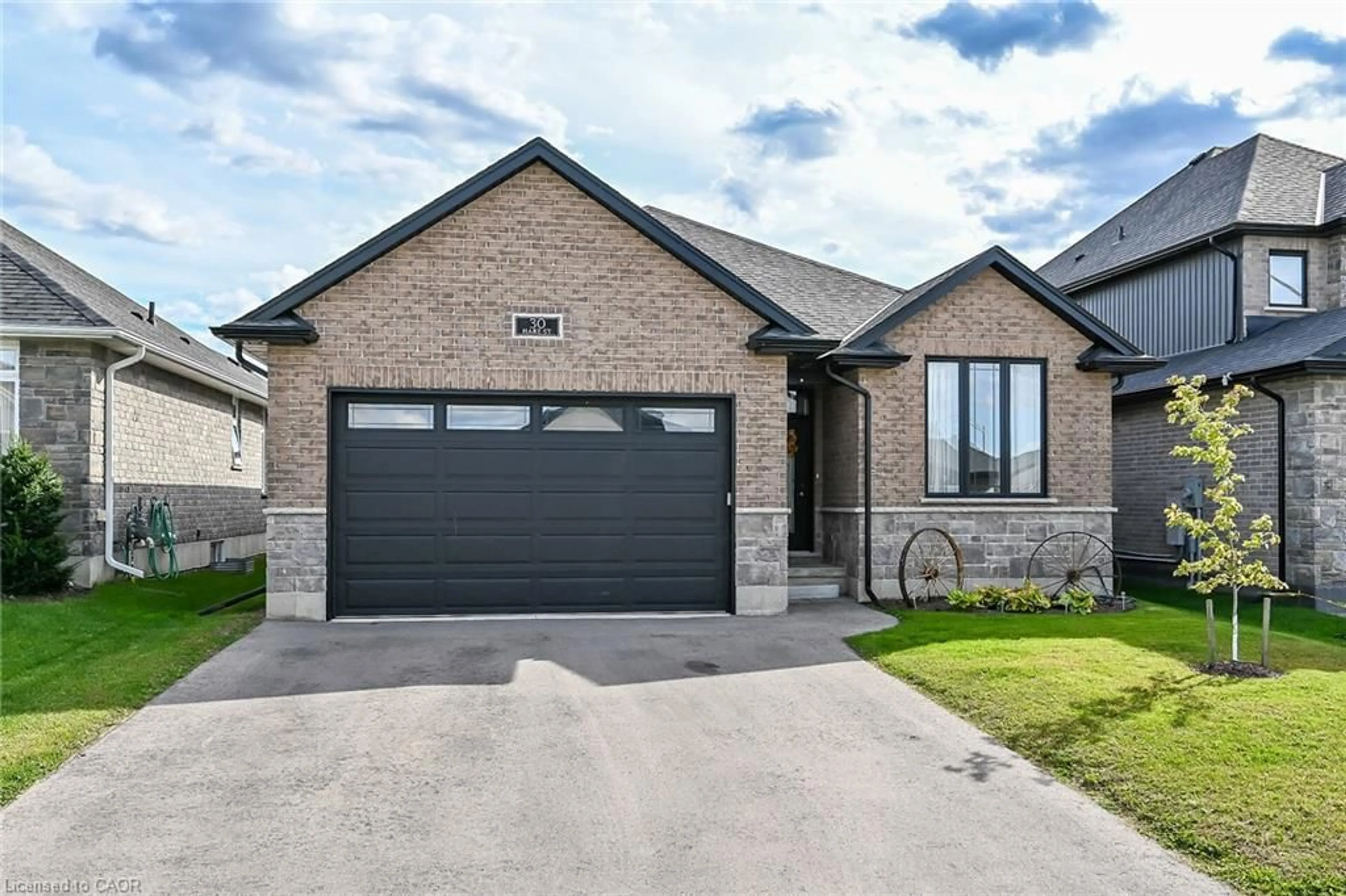 Home with brick exterior material, street for 30 Hare St, Waterford Ontario N0E 1Y0