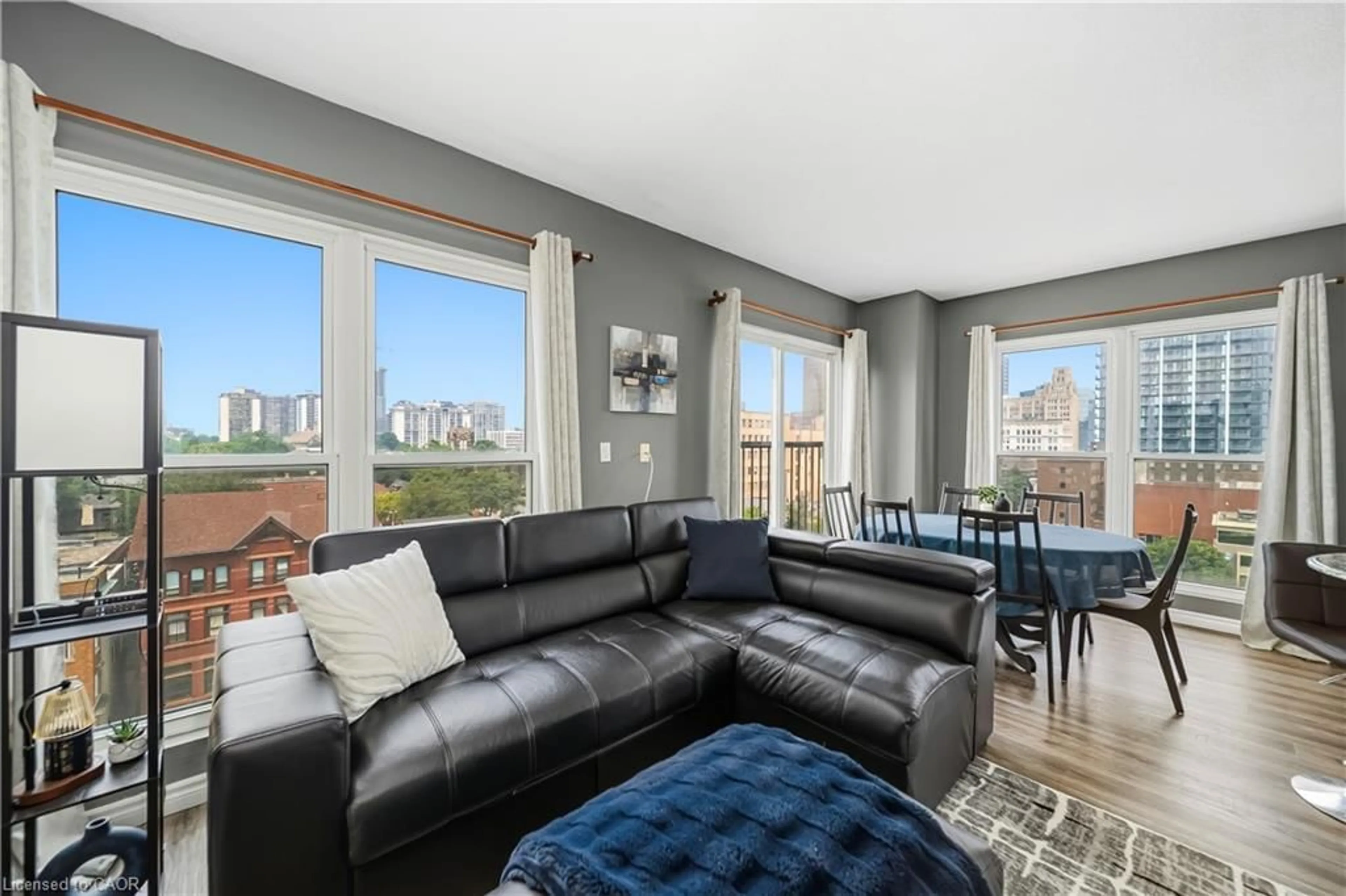 Living room with furniture, unknown for 135 James St #701, Hamilton Ontario L8P 2Z6
