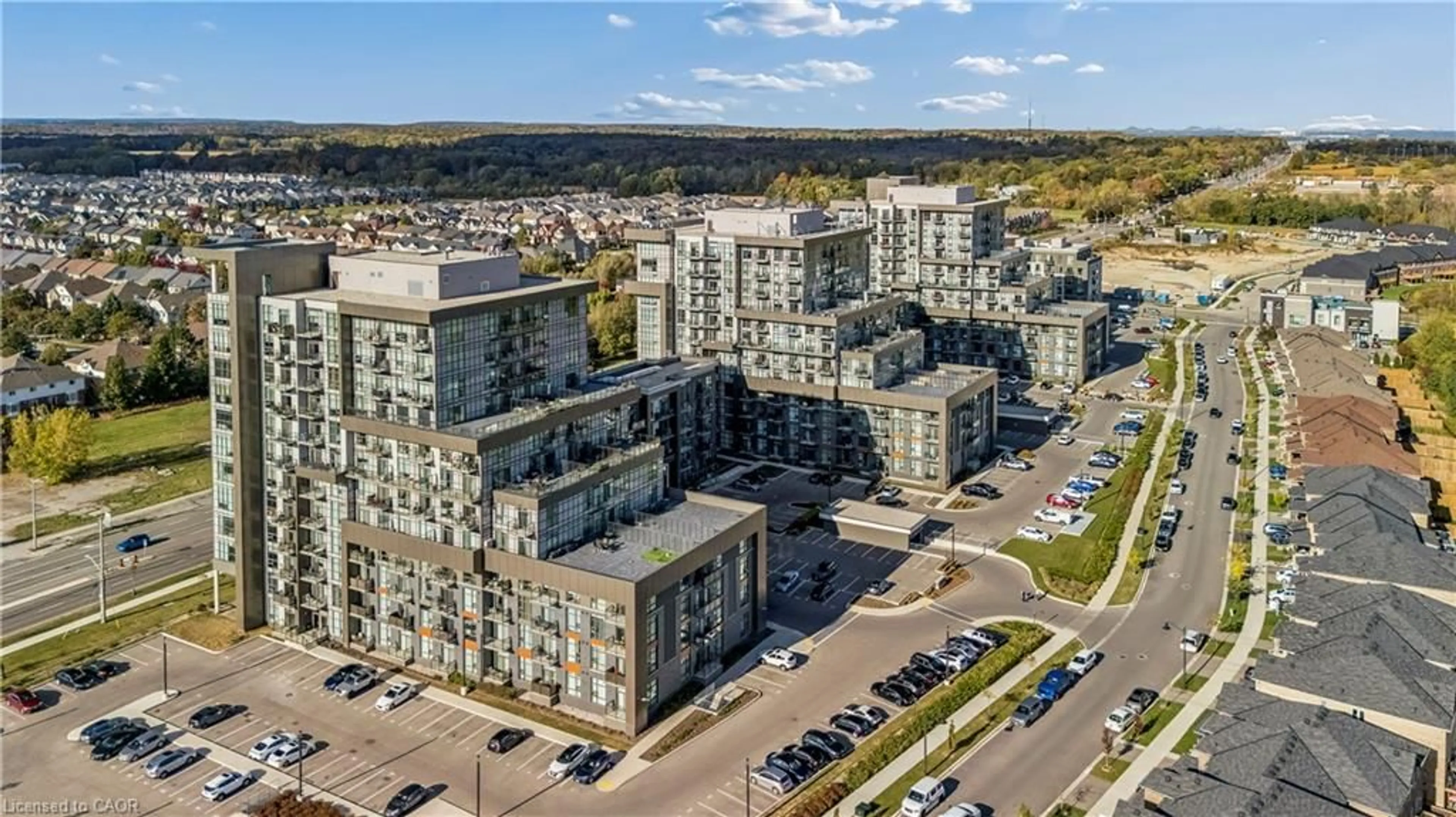 A pic from outside/outdoor area/front of a property/back of a property/a pic from drone, city buildings view from balcony for 450 Dundas St #1005, Waterdown Ontario L8B 1Z2