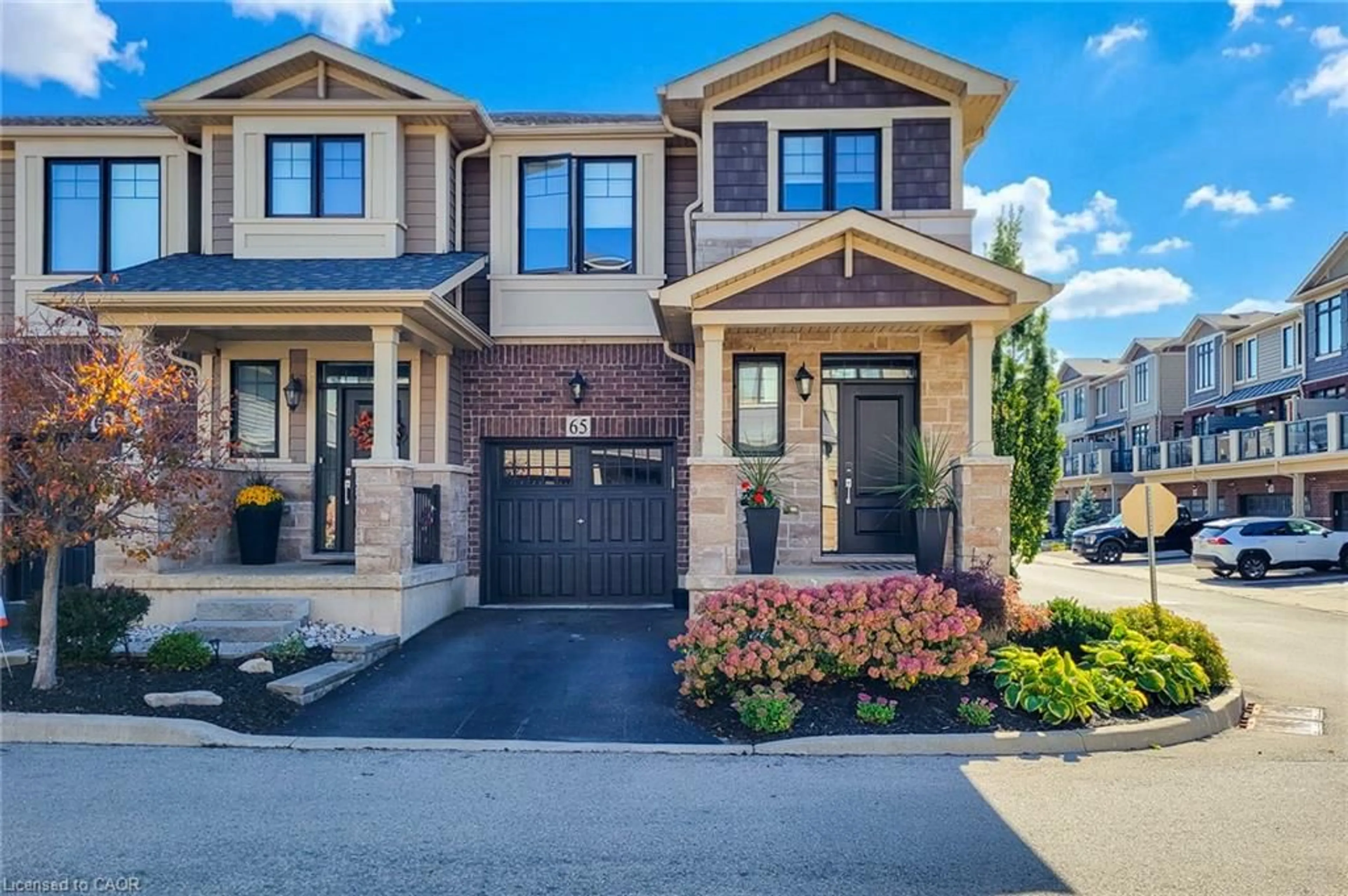Home with brick exterior material, street for 65 Waterview Lane, Grimsby Ontario L3M 0H2