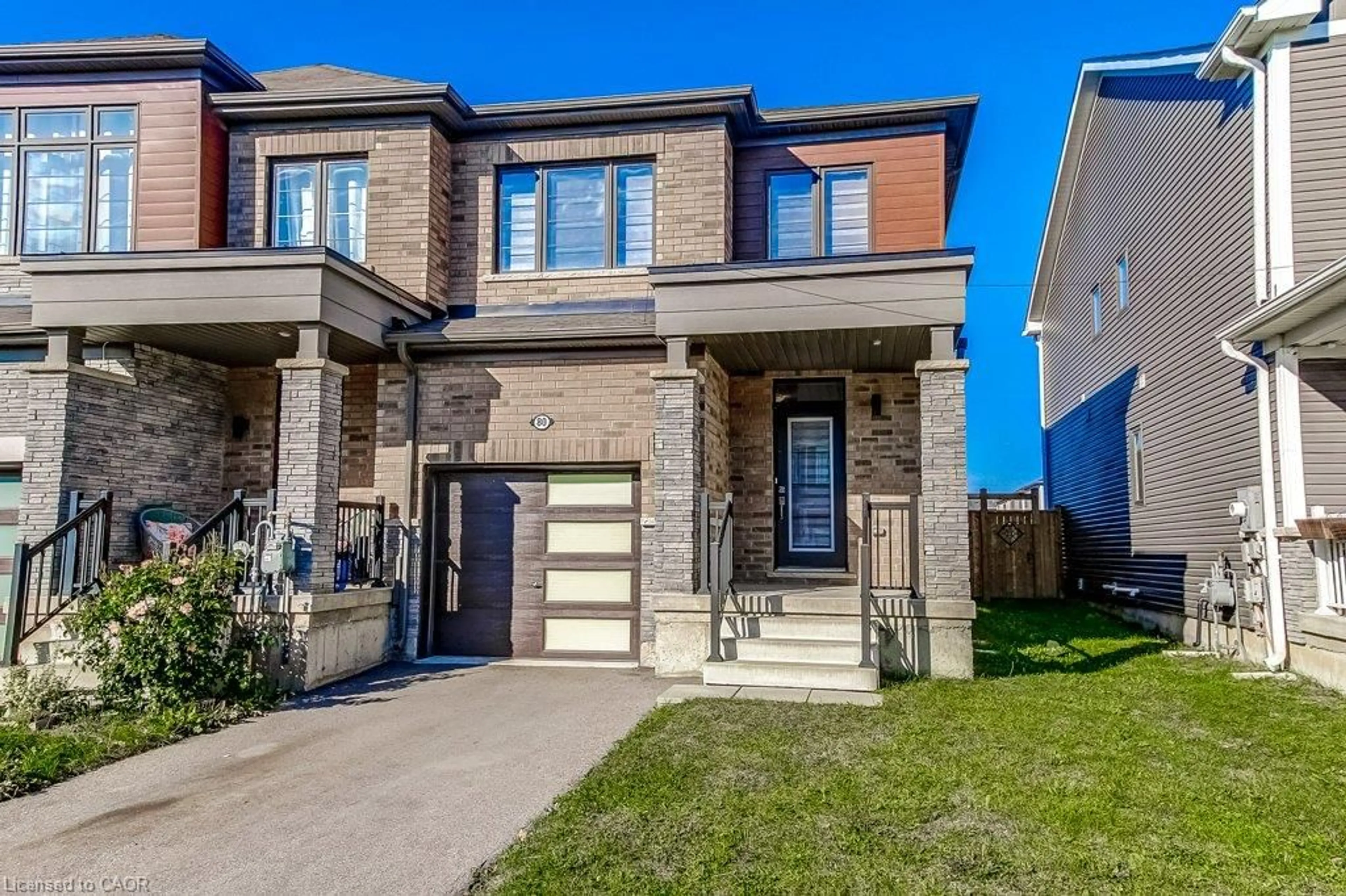 Home with brick exterior material, street for 80 Oaktree Dr, Caledonia Ontario N3W 0E8