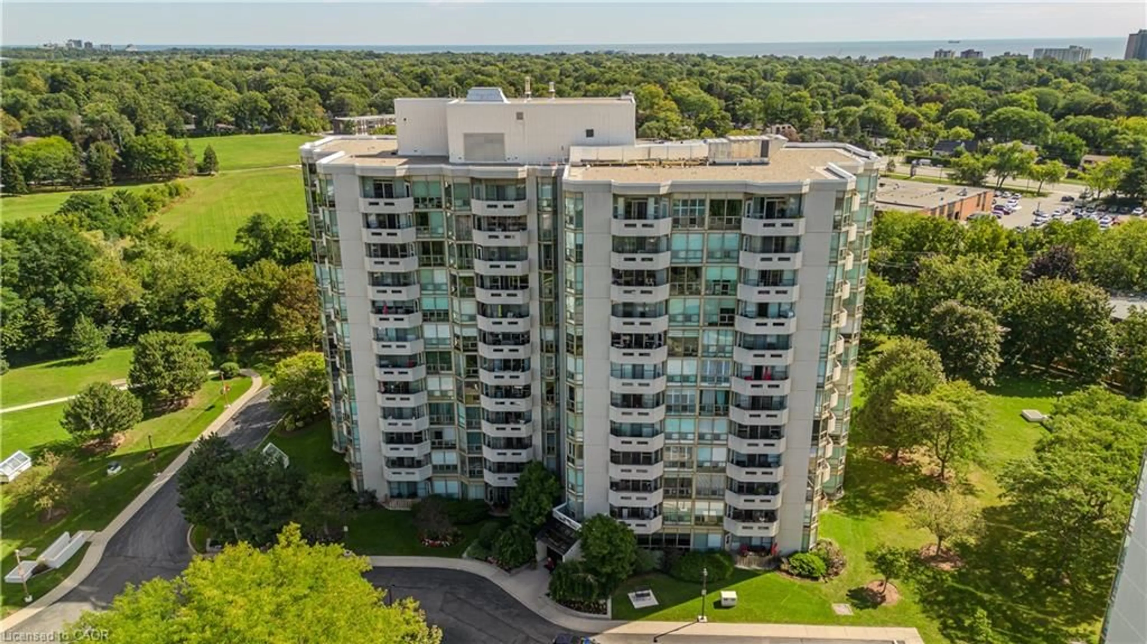 A pic from outside/outdoor area/front of a property/back of a property/a pic from drone, city buildings view from balcony for 5080 Pinedale Ave #1006, Burlington Ontario L7L 5V7