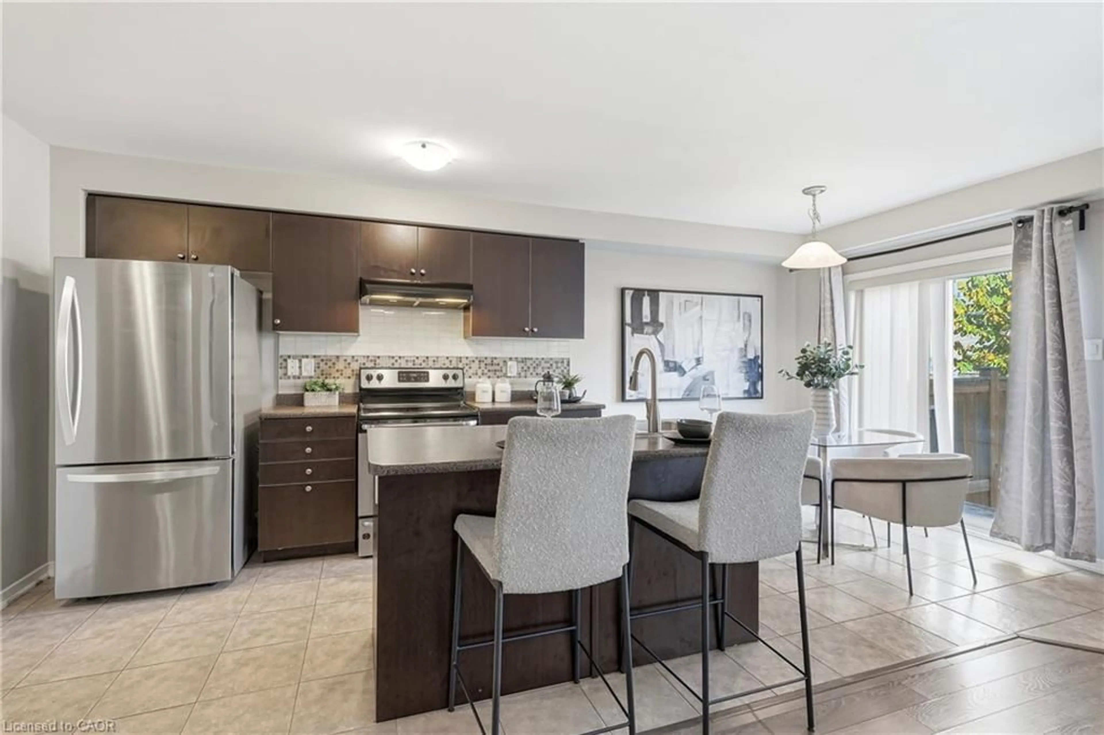 Open concept kitchen, ceramic/tile floor for 153 English Lane, Brantford Ontario N3T 0J6