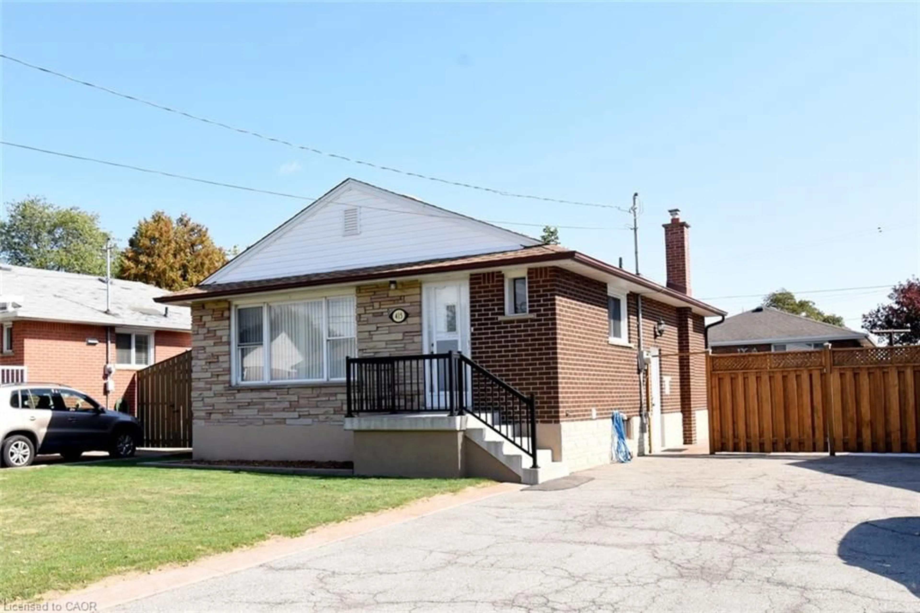 Home with brick exterior material, street for 415 East 15th St, Hamilton Ontario L9A 4G9