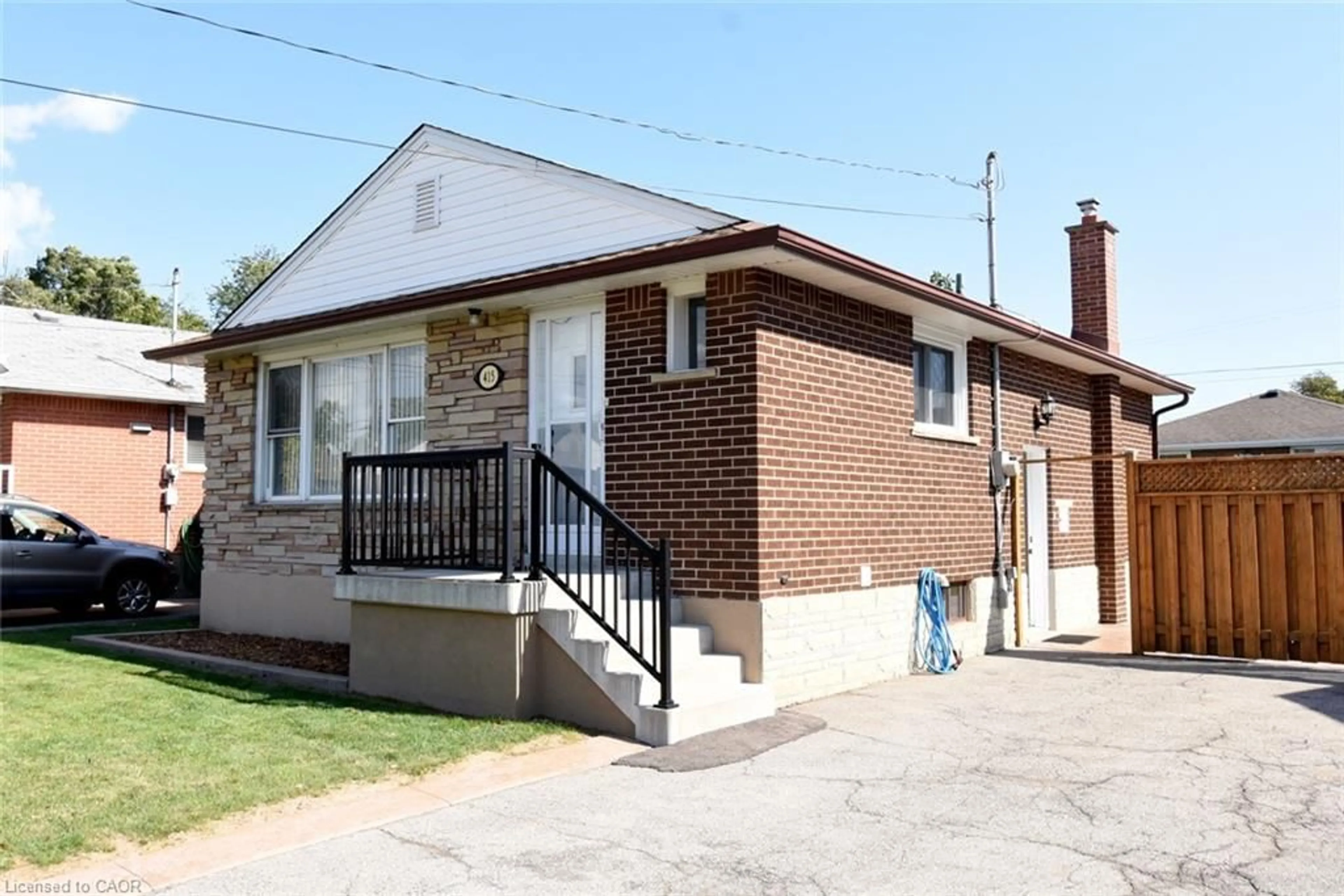 Home with brick exterior material, street for 415 East 15th St, Hamilton Ontario L9A 4G9