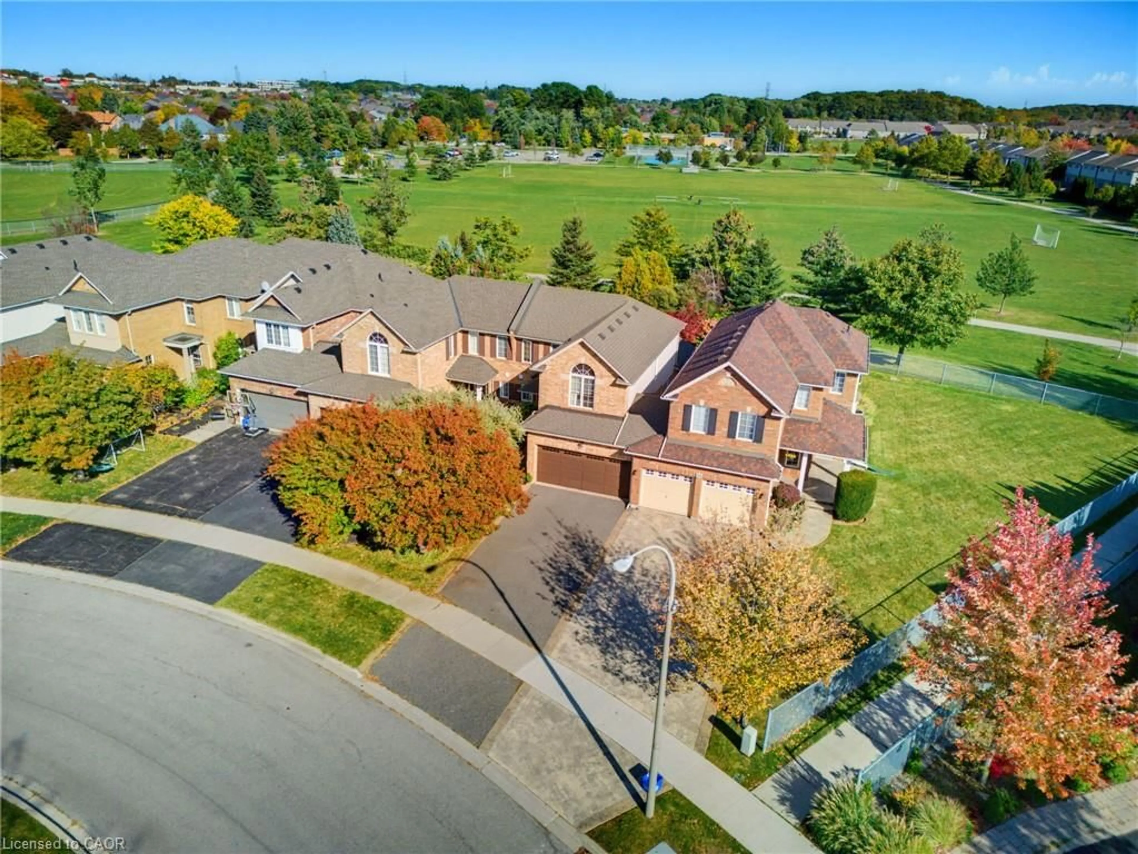 A pic from outside/outdoor area/front of a property/back of a property/a pic from drone, street for 103 Thoroughbred Blvd, Ancaster Ontario L9K 1N3