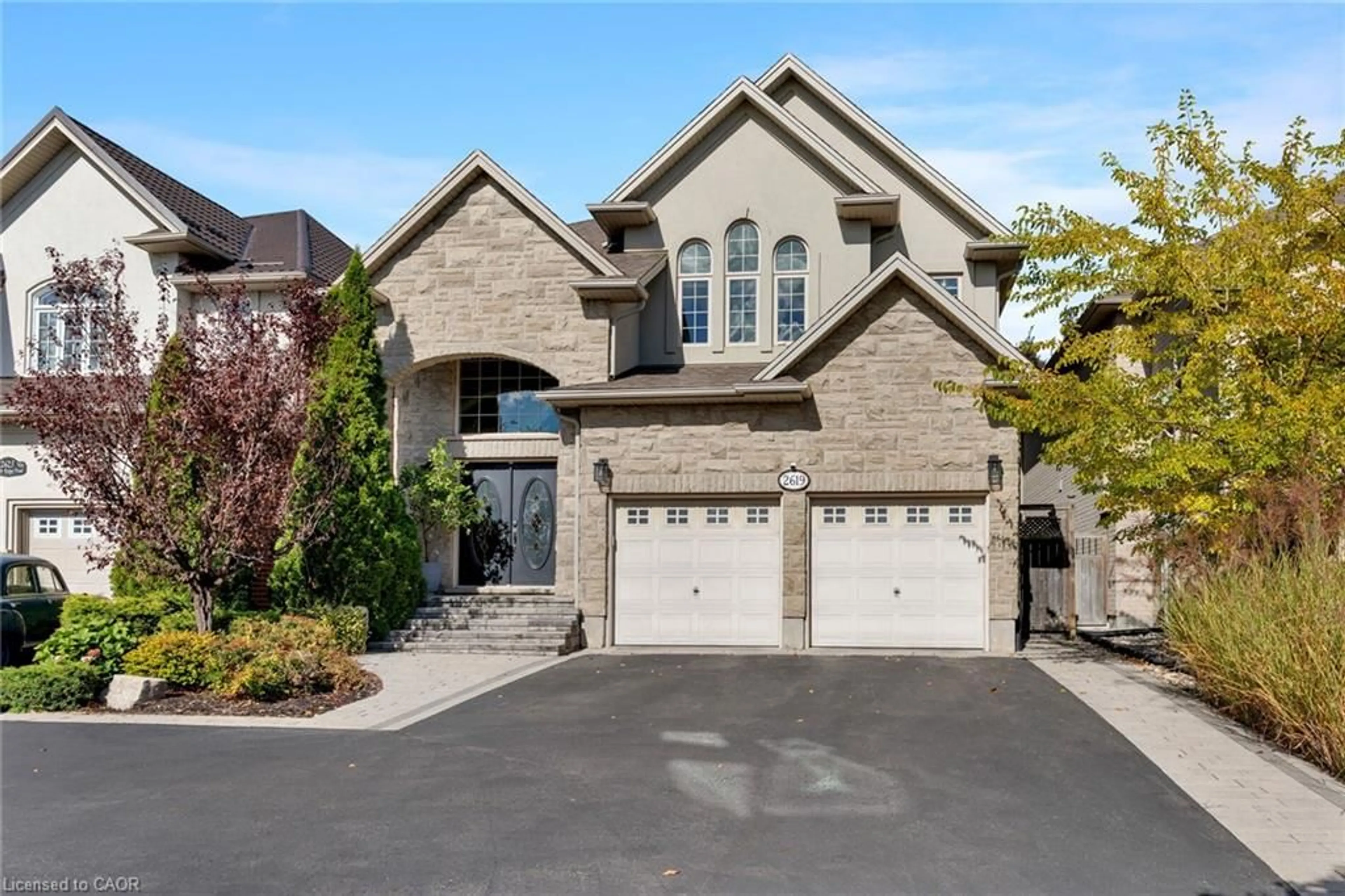 Home with brick exterior material, street for 2619 North Ridge Trail, Oakville Ontario L6H 7L5