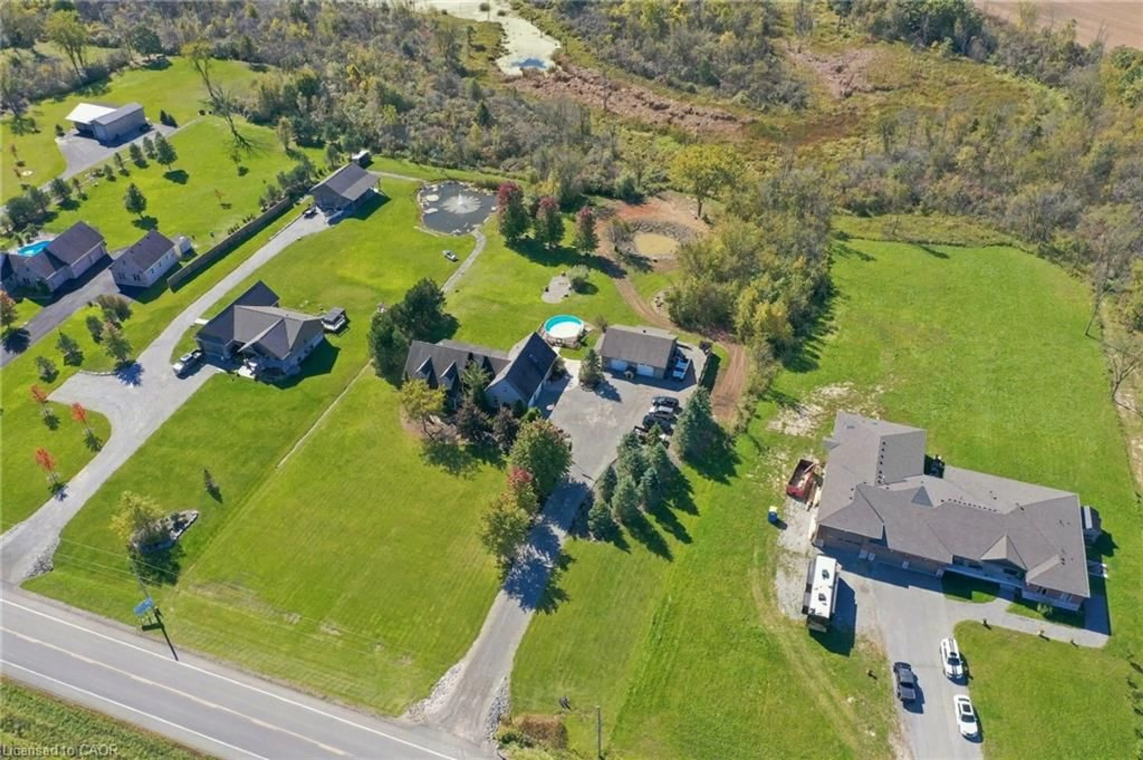 A pic from outside/outdoor area/front of a property/back of a property/a pic from drone, street for 860 Regional 27 Rd, Wellandport Ontario L0R 2J0