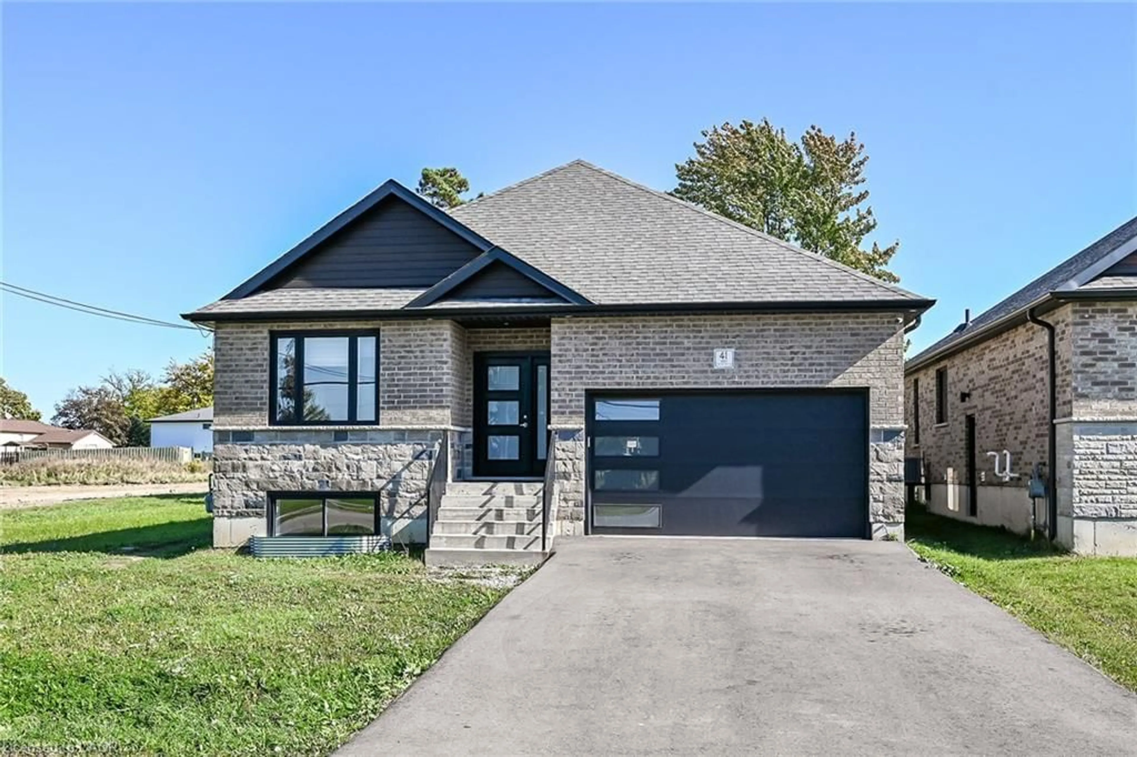 Home with brick exterior material, street for 41 Eleanor Ave, Hamilton Ontario L8W 1C7
