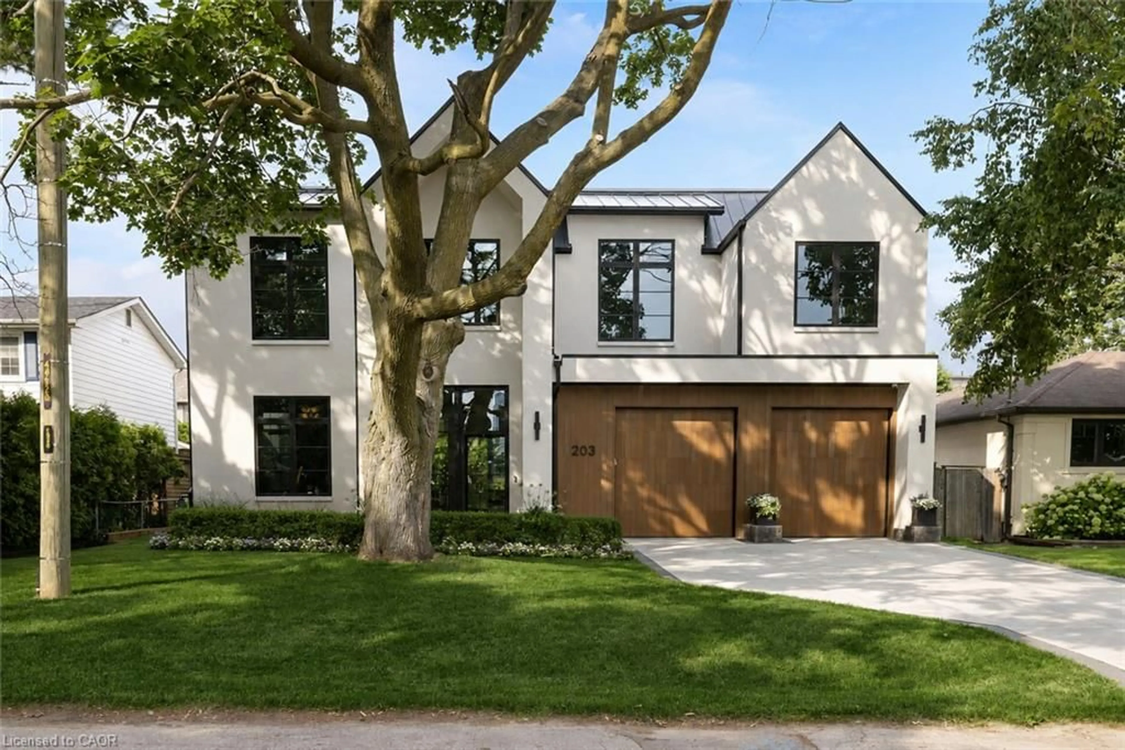 Home with brick exterior material, street for 203 Weybourne Rd, Oakville Ontario L6K 2T7