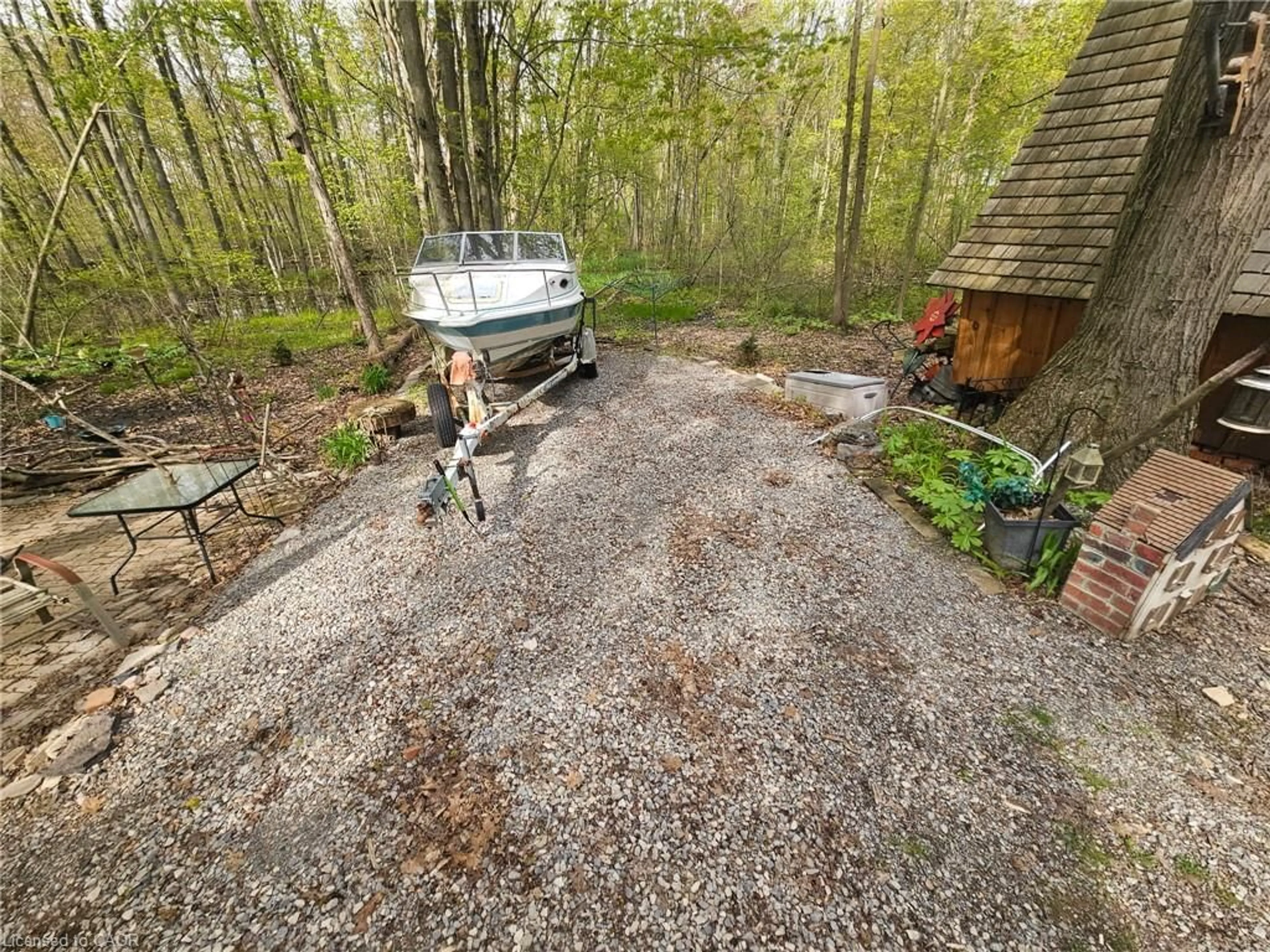 A pic from outside/outdoor area/front of a property/back of a property/a pic from drone, forest/trees view for 334 Rattlesnake Rd #45, Dunnville Ontario N0A 1K0