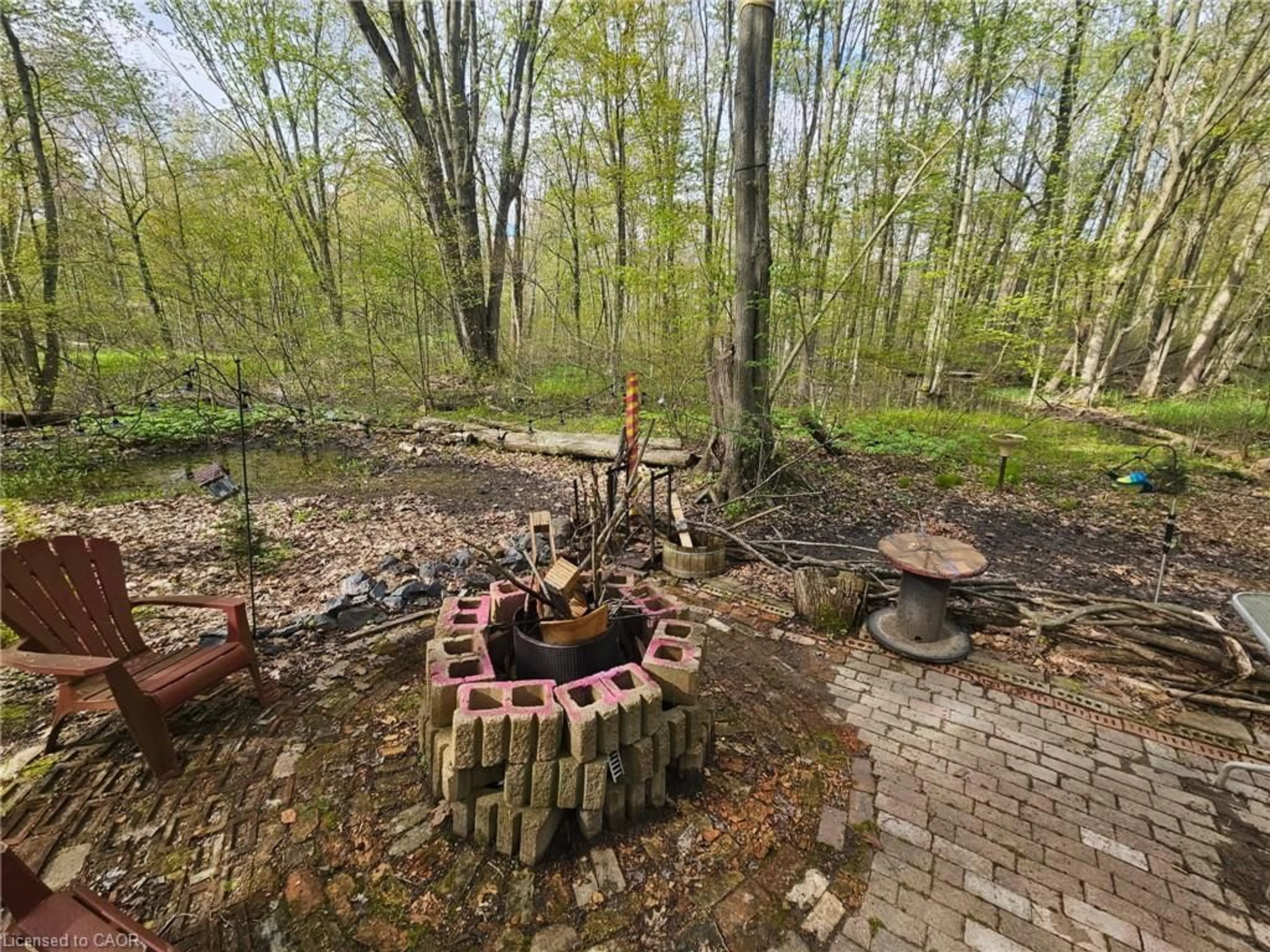 A pic from outside/outdoor area/front of a property/back of a property/a pic from drone, forest/trees view for 334 Rattlesnake Rd #45, Dunnville Ontario N0A 1K0