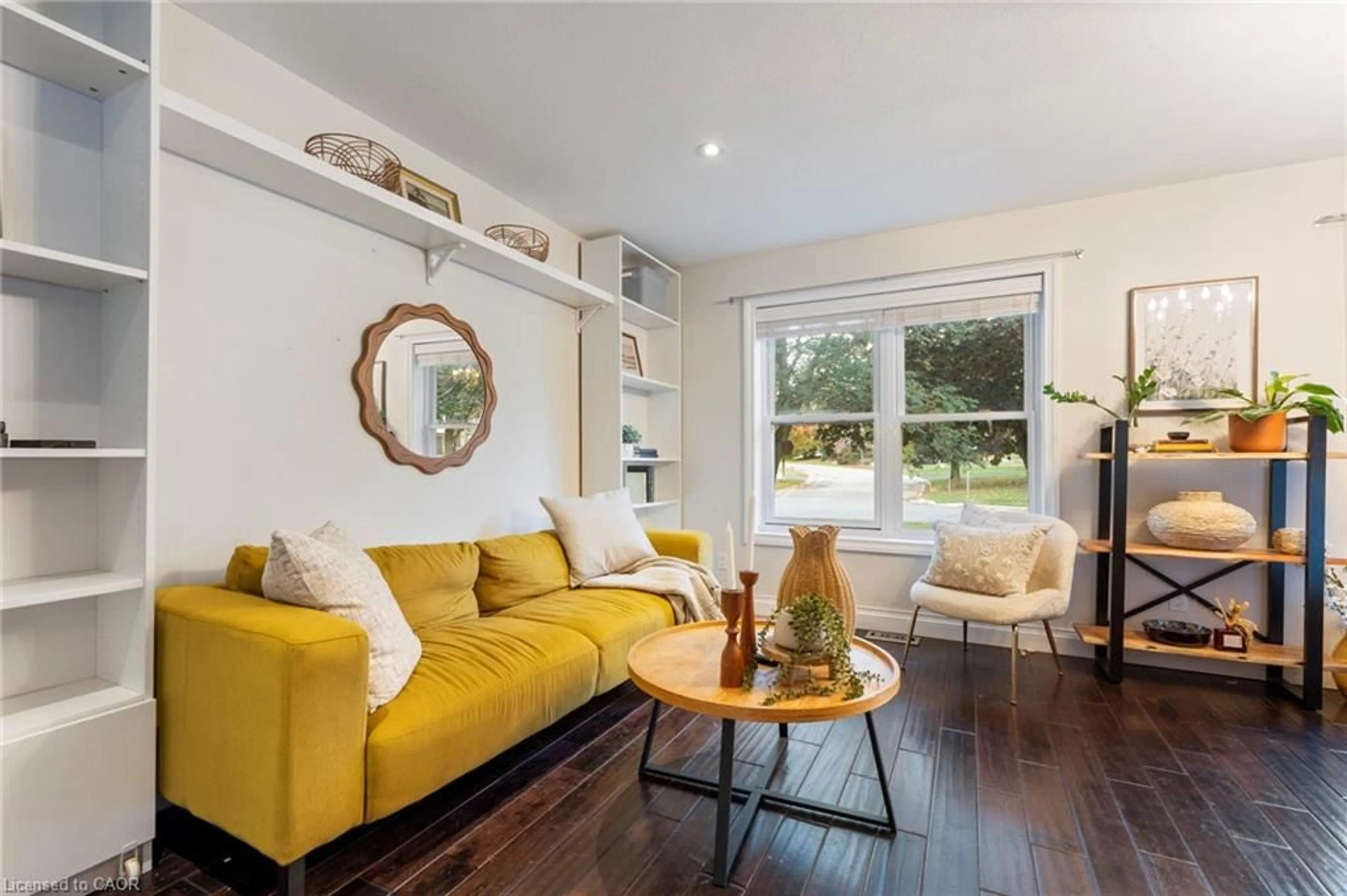 Living room with furniture, wood/laminate floor for 273 Colborne St, Elora Ontario N0B 1S0