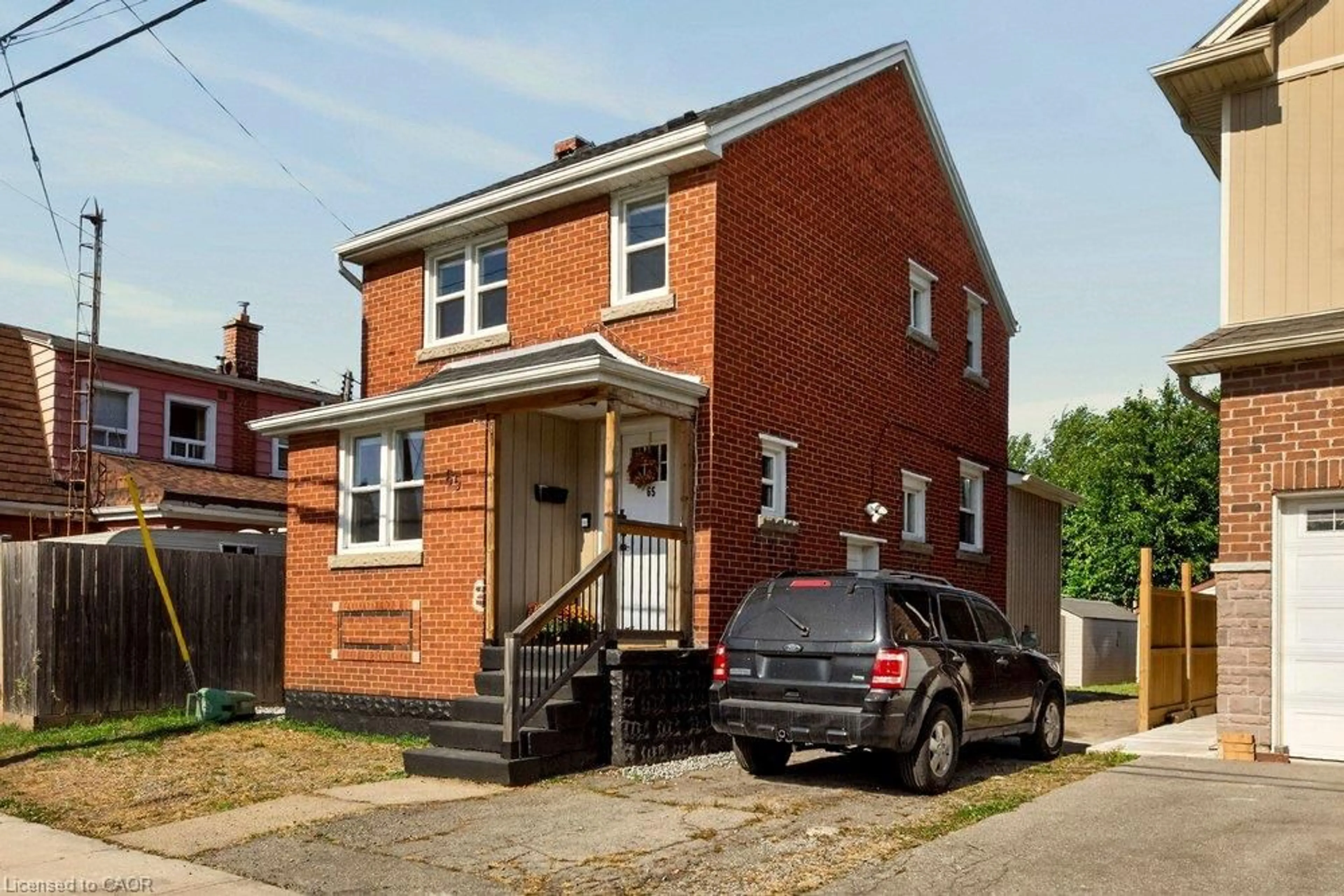 Home with brick exterior material, street for 65 Edinburgh Ave, Hamilton Ontario L8H 2C6